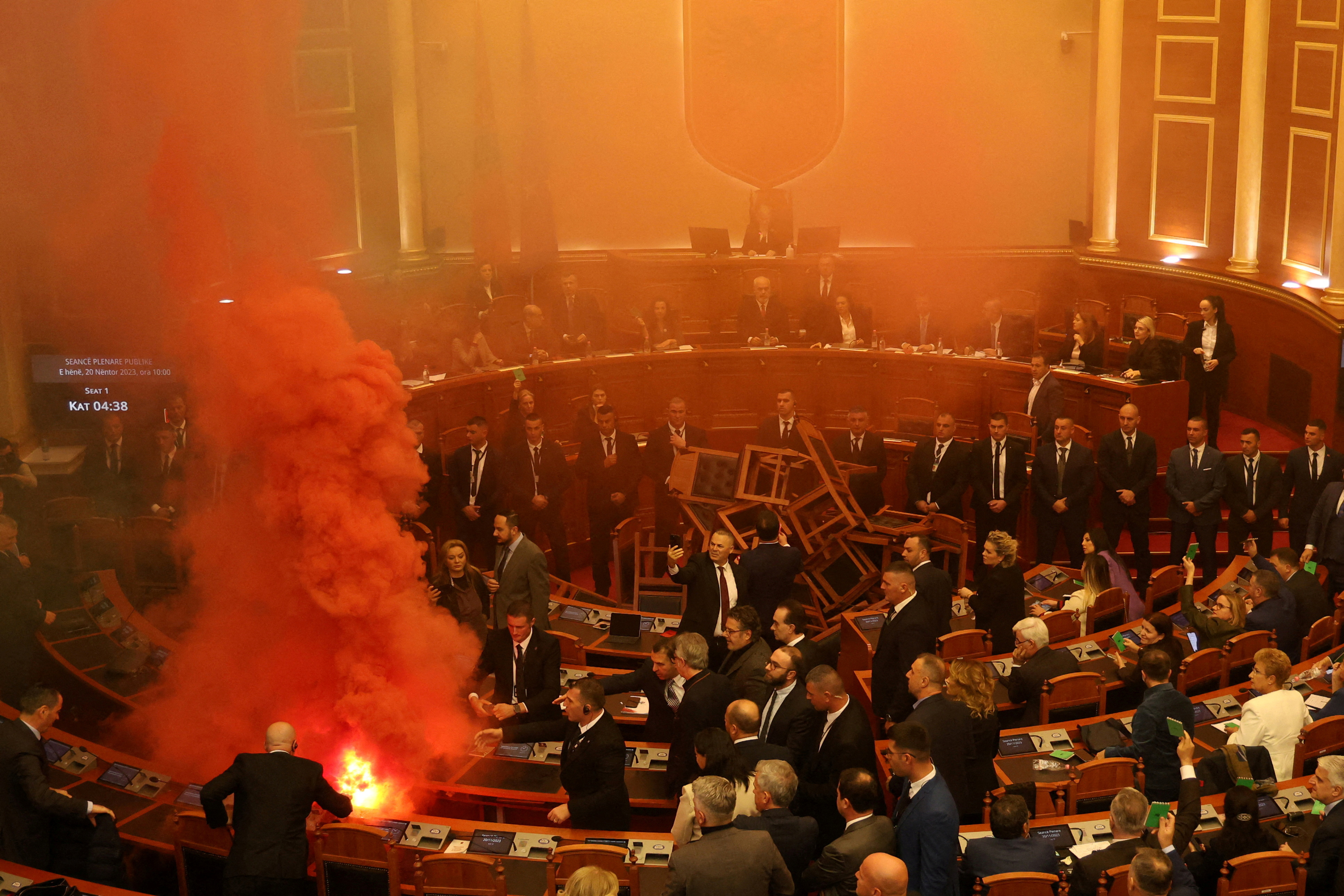 MP of Democratic Party light coloured smoke bomb in Tirana