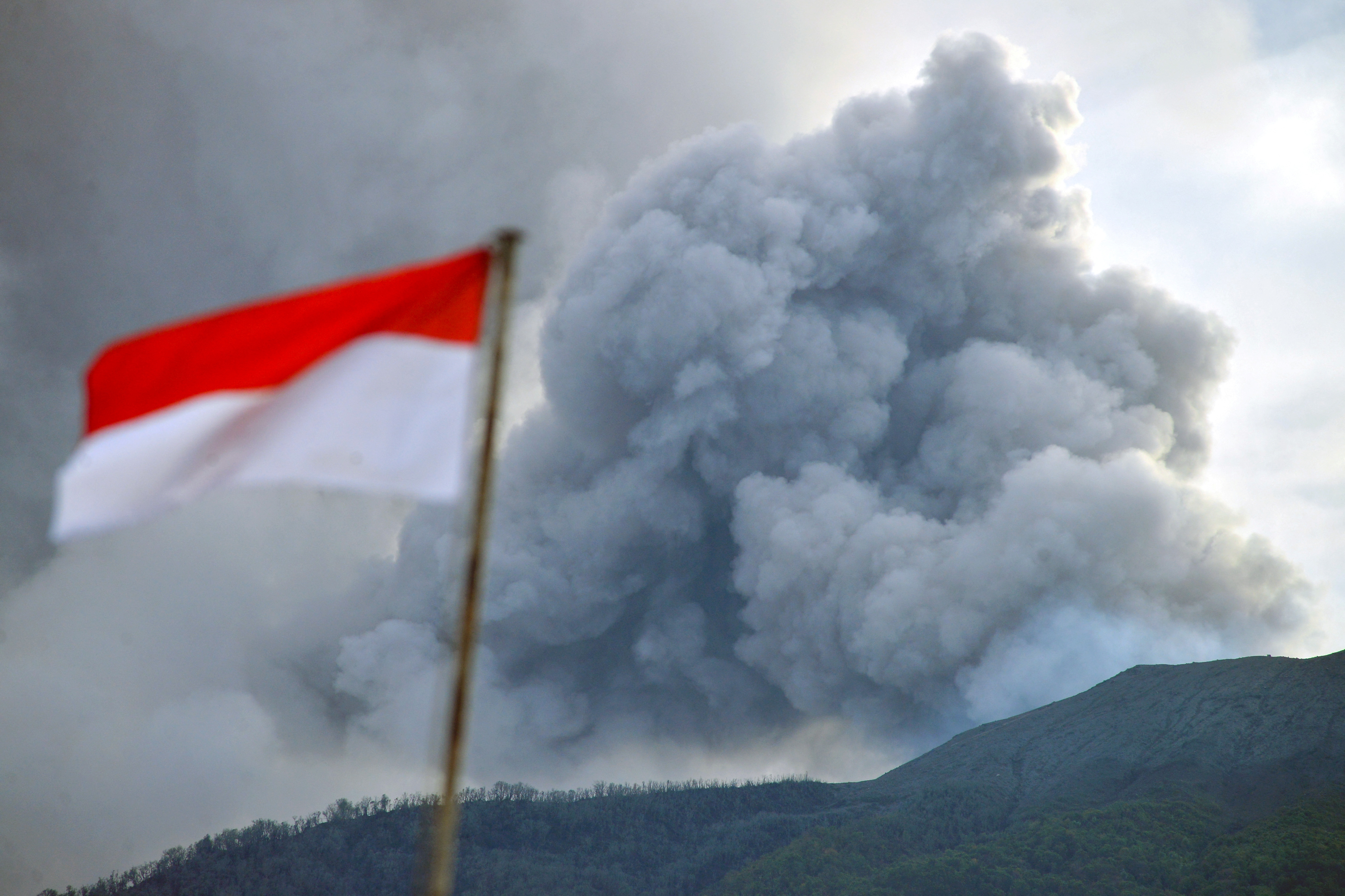 Mount Marapi volcano spews volcanic ash as seen from Nagari Batu Palano in Agam
