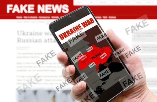 War in Ukraine and Fake News theme, Russia and Ukraine conflict on mobile phone screen. Russia vs Ukraine in media. Concept of politics, communication