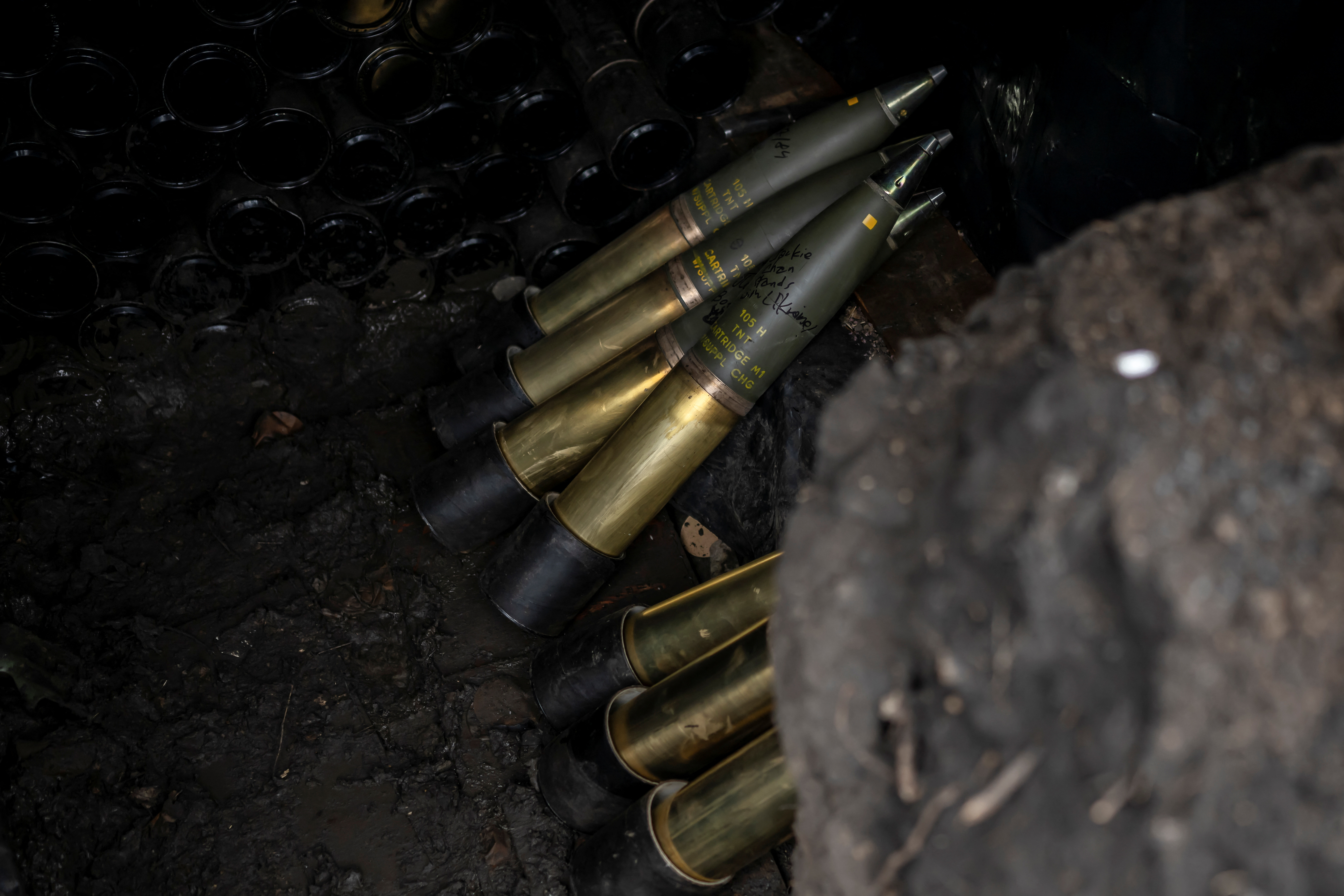 Shells for a howitzer are seen at a position of Ukrainian servicemen near the front-line town of Bakhmut