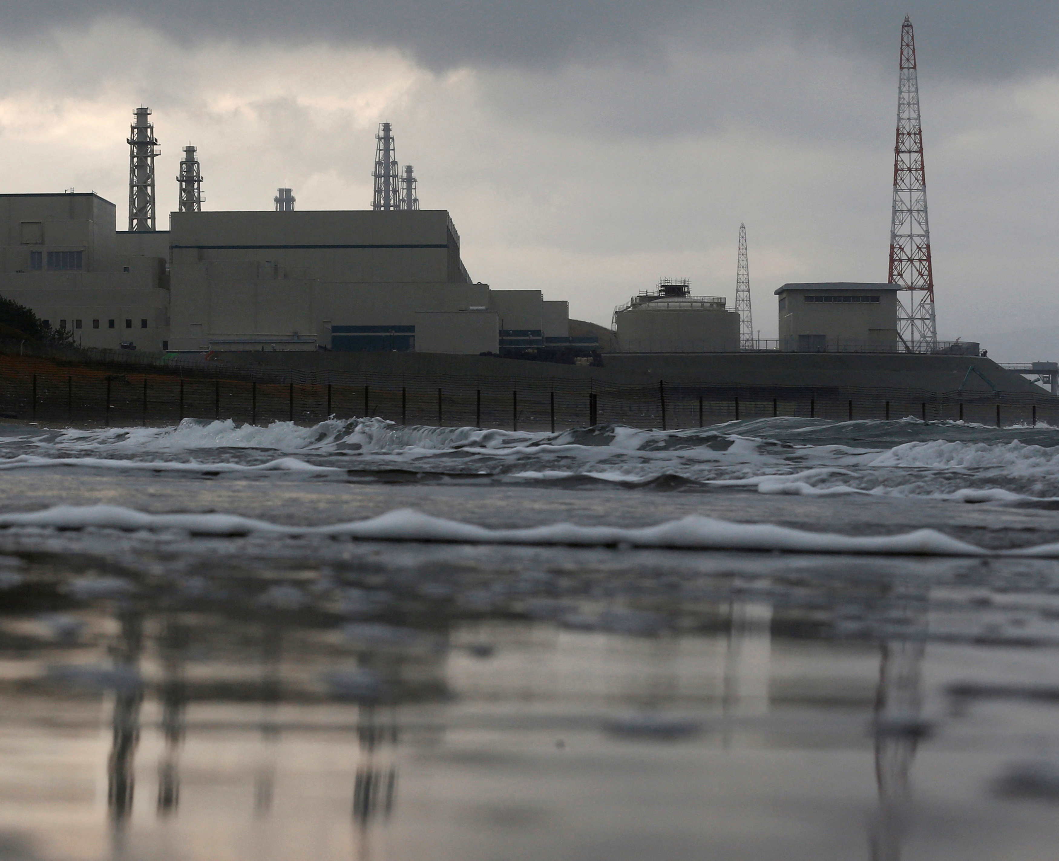 FILE PHOTO: Tokyo Electric Power Co.'s Kashiwazaki Kariwa nuclear power plant, which is the world's biggest, is seen from a seaside in Kashiwazaki