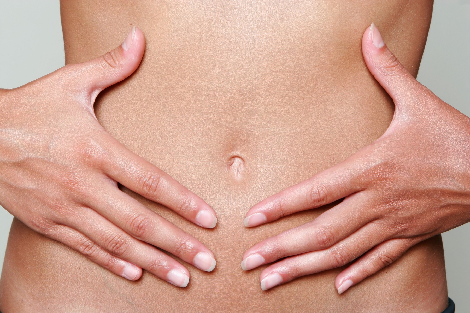 hands on stomach belly button