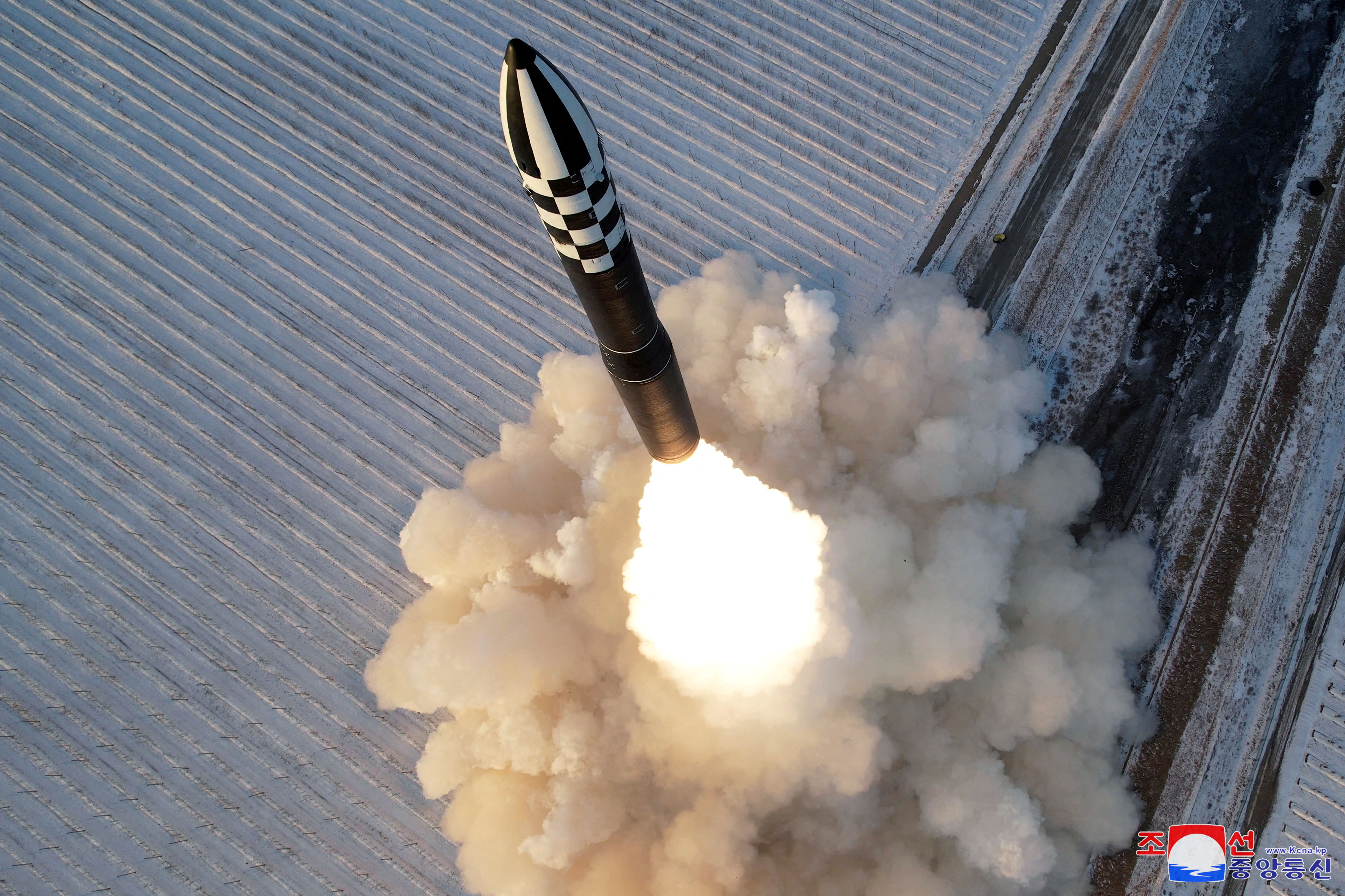 A Hwasong-18 intercontinental ballistic missile is launched during a drill