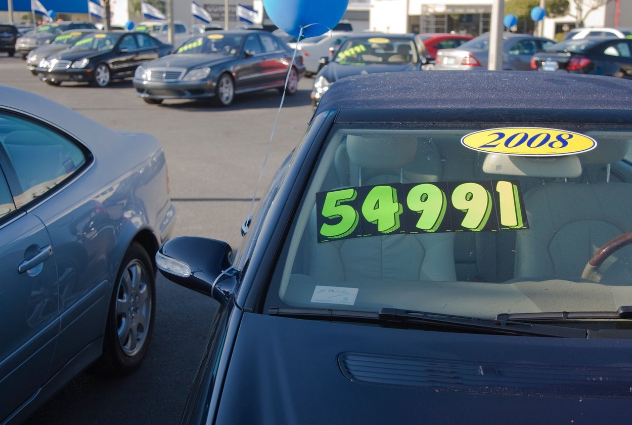 Luxury cars on display at a car lot