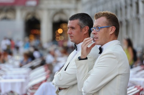 Waiters in St Mark's Square, Venice, Italy.