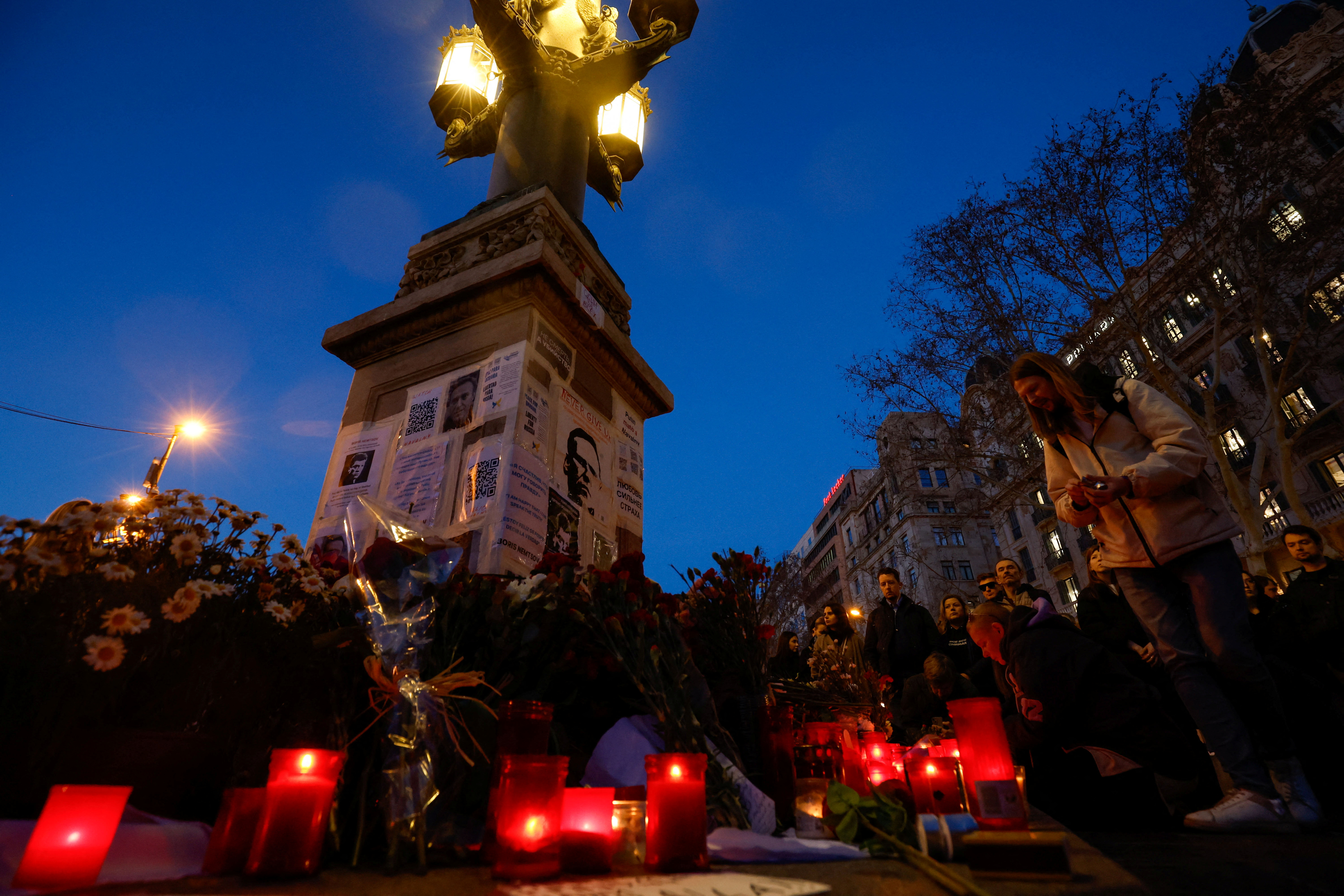 People gather in memory of late Russian opposition leader Alexei Navalny, in Barcelona