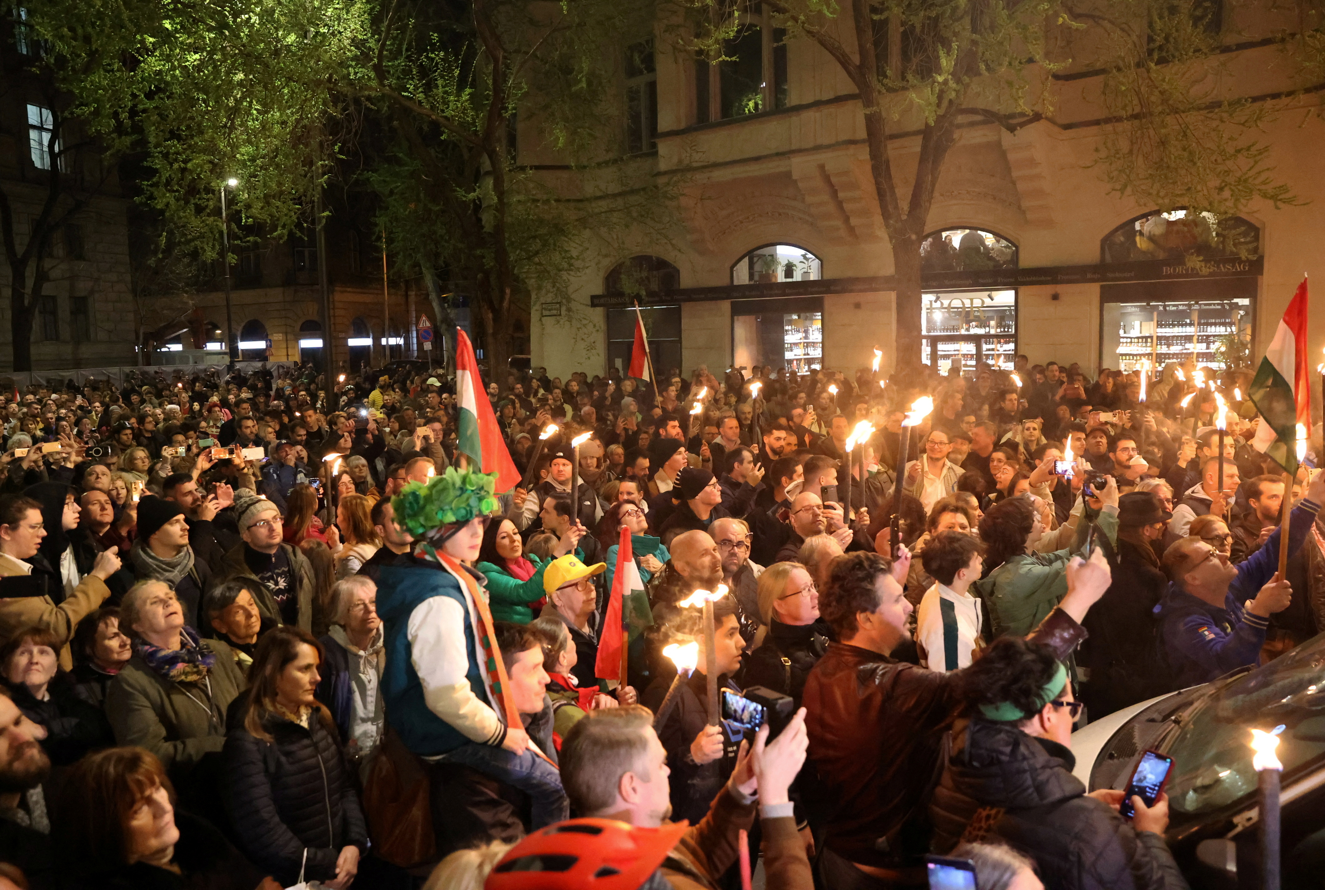 People attend a protest demanding the chief prosecutor Polt and Prime Minister Orban to resign, in Budapest