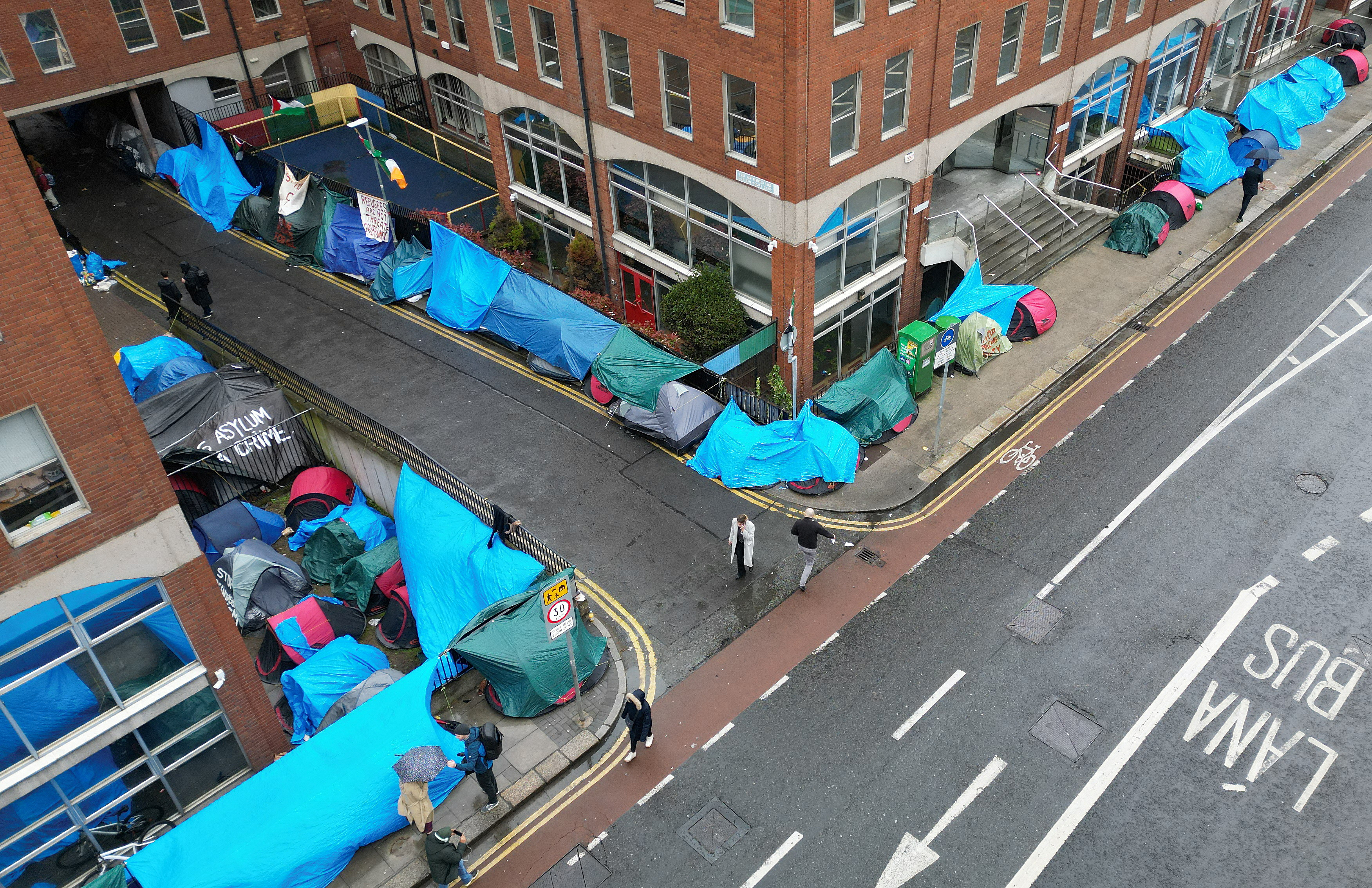 Asylum seekers camped outside the International Protection Office, in Dublin