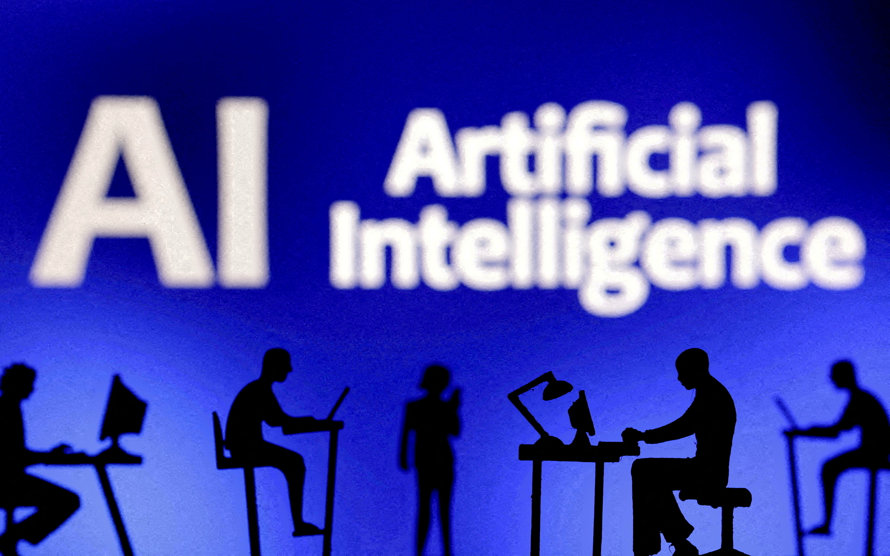 FILE PHOTO: Illustration shows words "Artificial Intelligence AI
