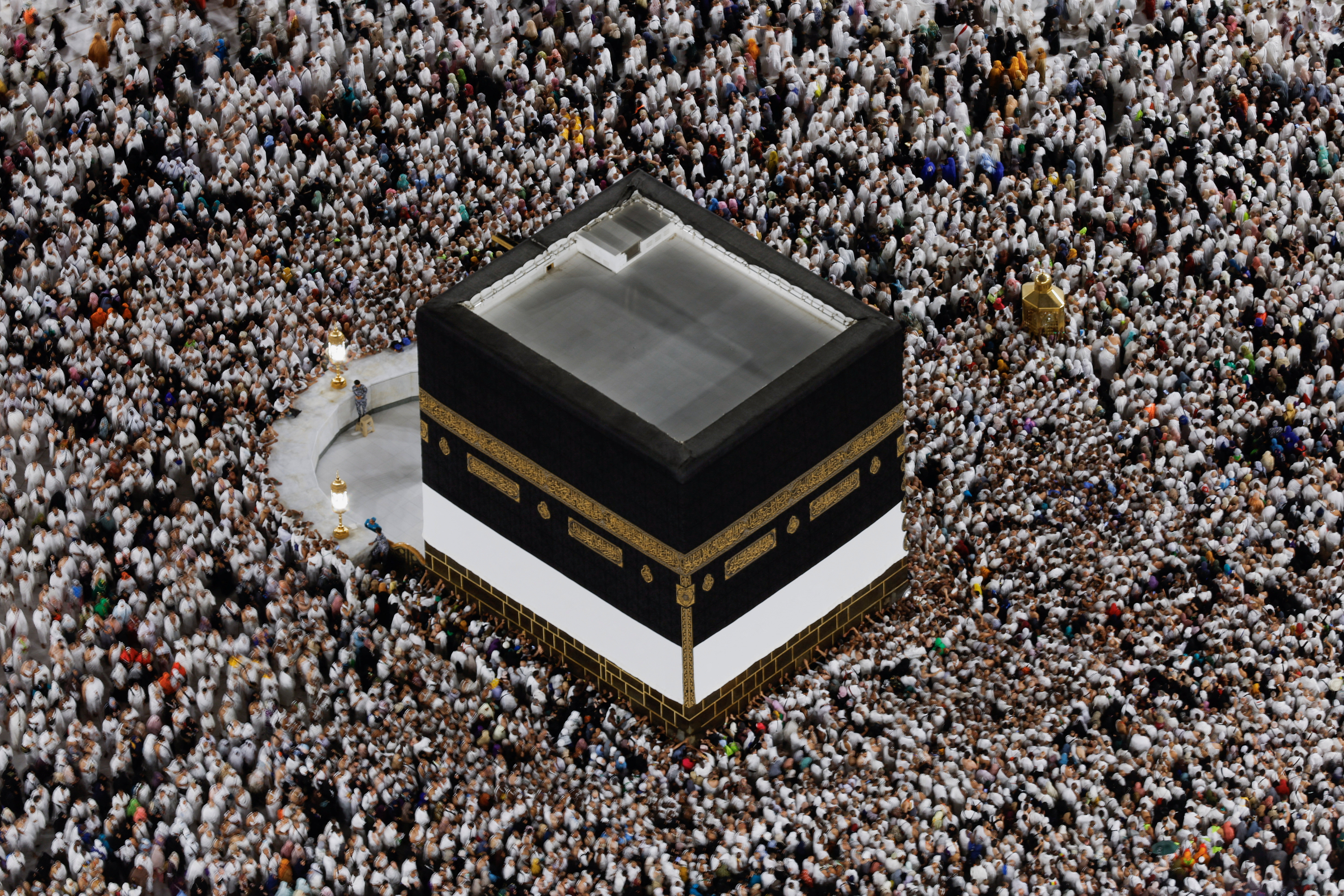 Pilgrims circle Kaaba in Mecca