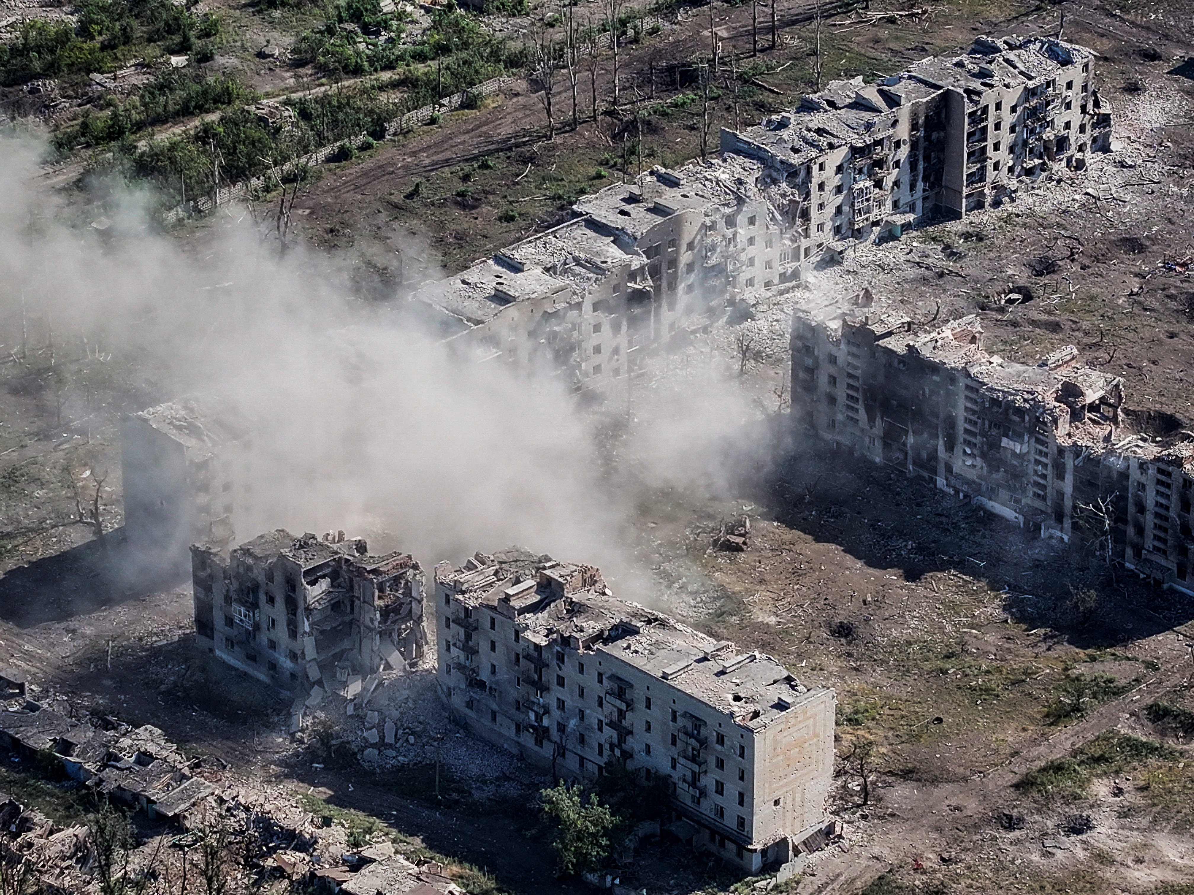 A drone view shows destroyed buildings in the frontline town of Chasiv Yar