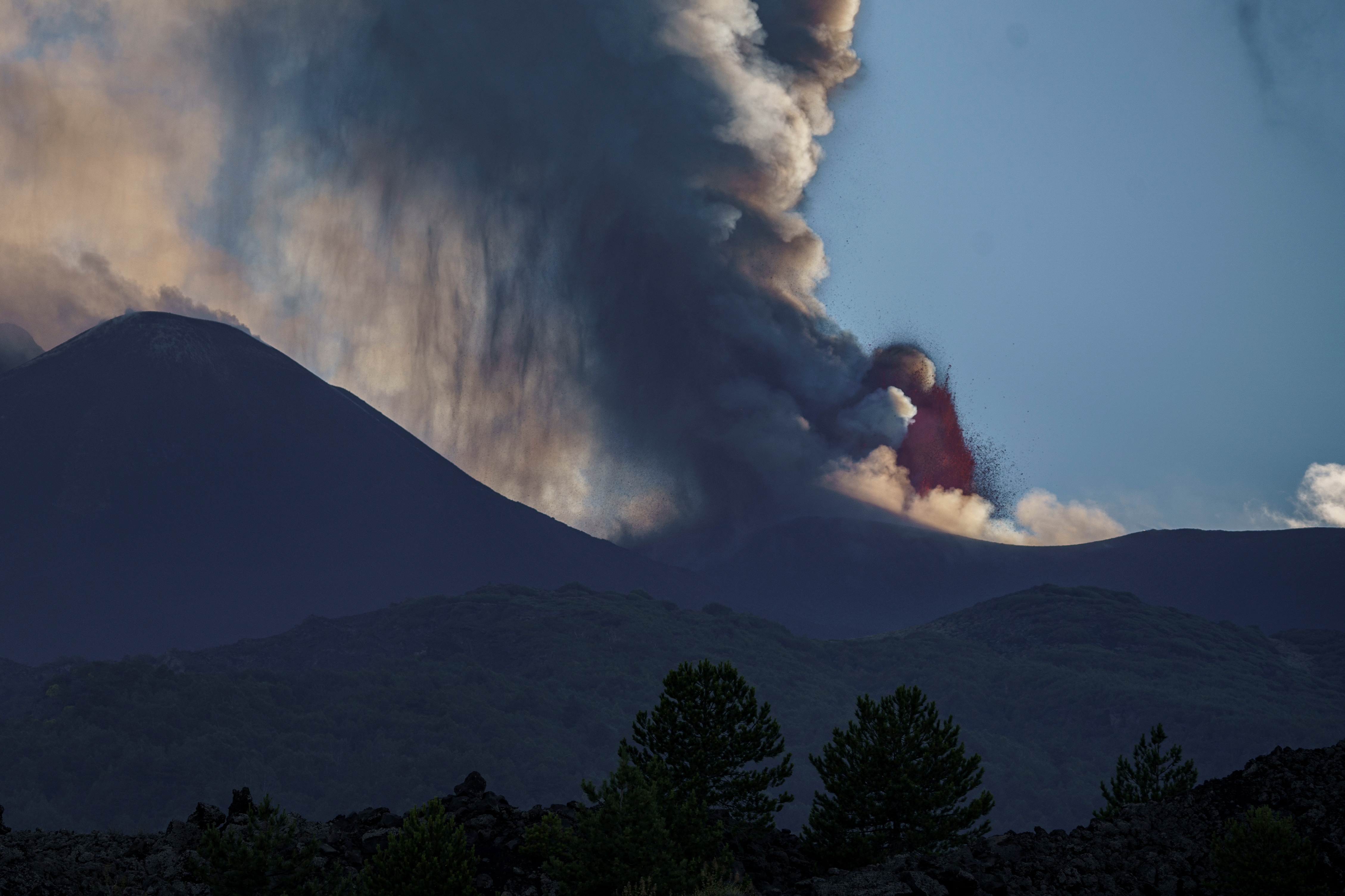 Italy's Mount Etna erupts