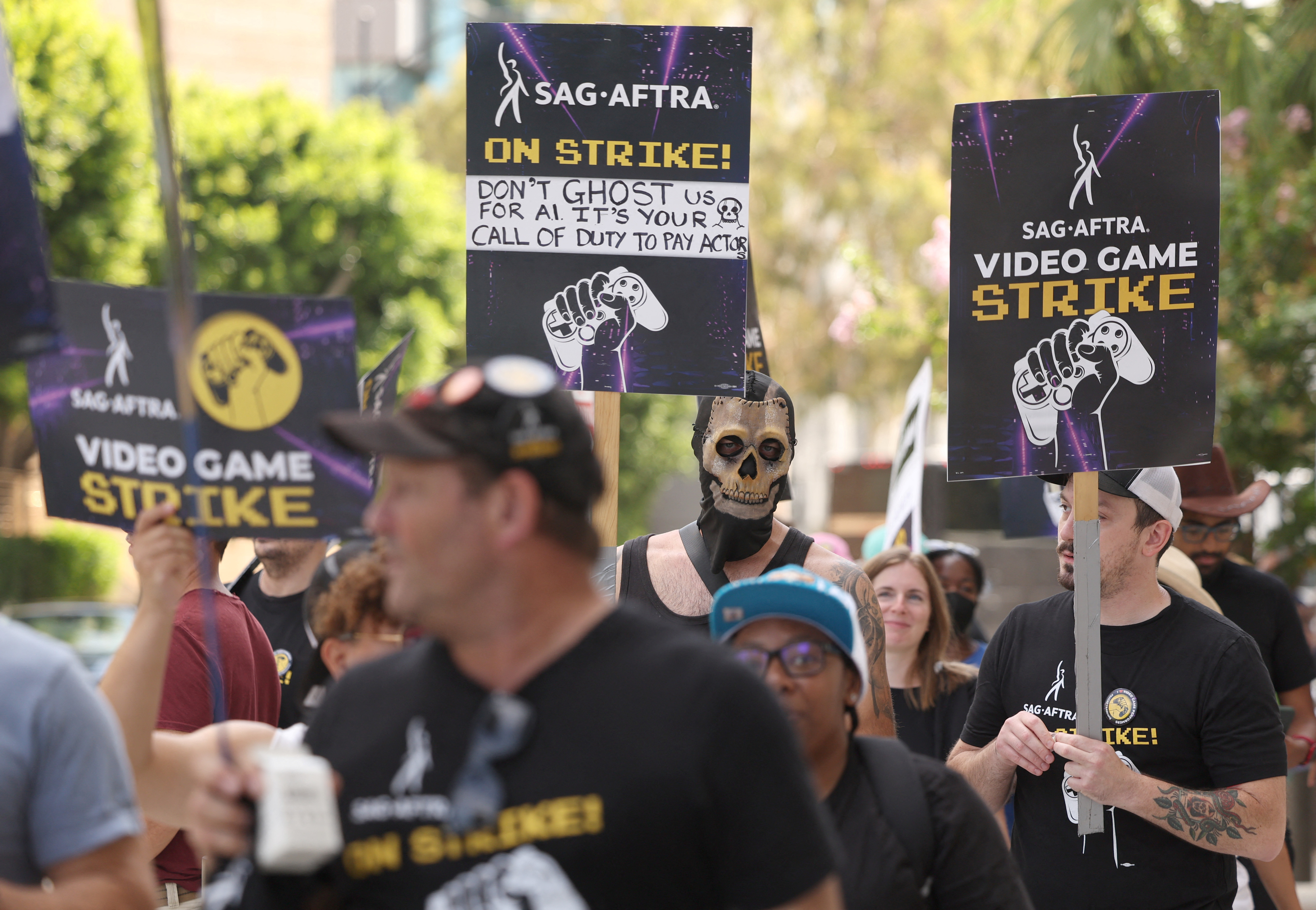 Activists and members take part in the SAG-AFTRA Video Game Strike kick-off picket outside Warner Bros. Games in Burbank
