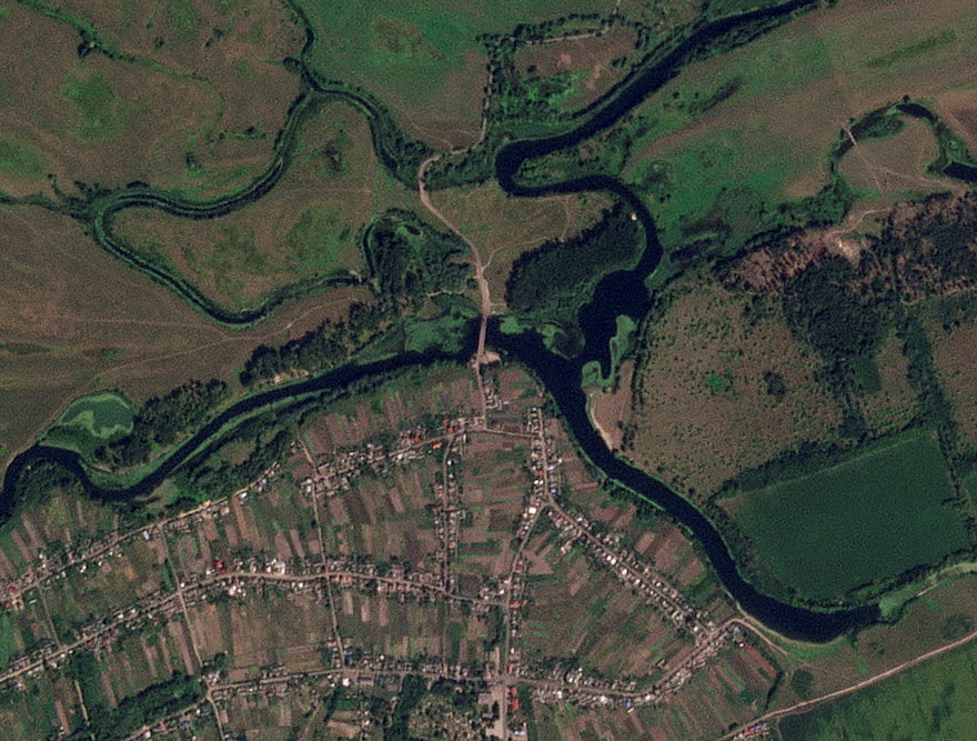 A satellite image shows a strategic bridge over the Seym River that has been destroyed, in Zvannoe