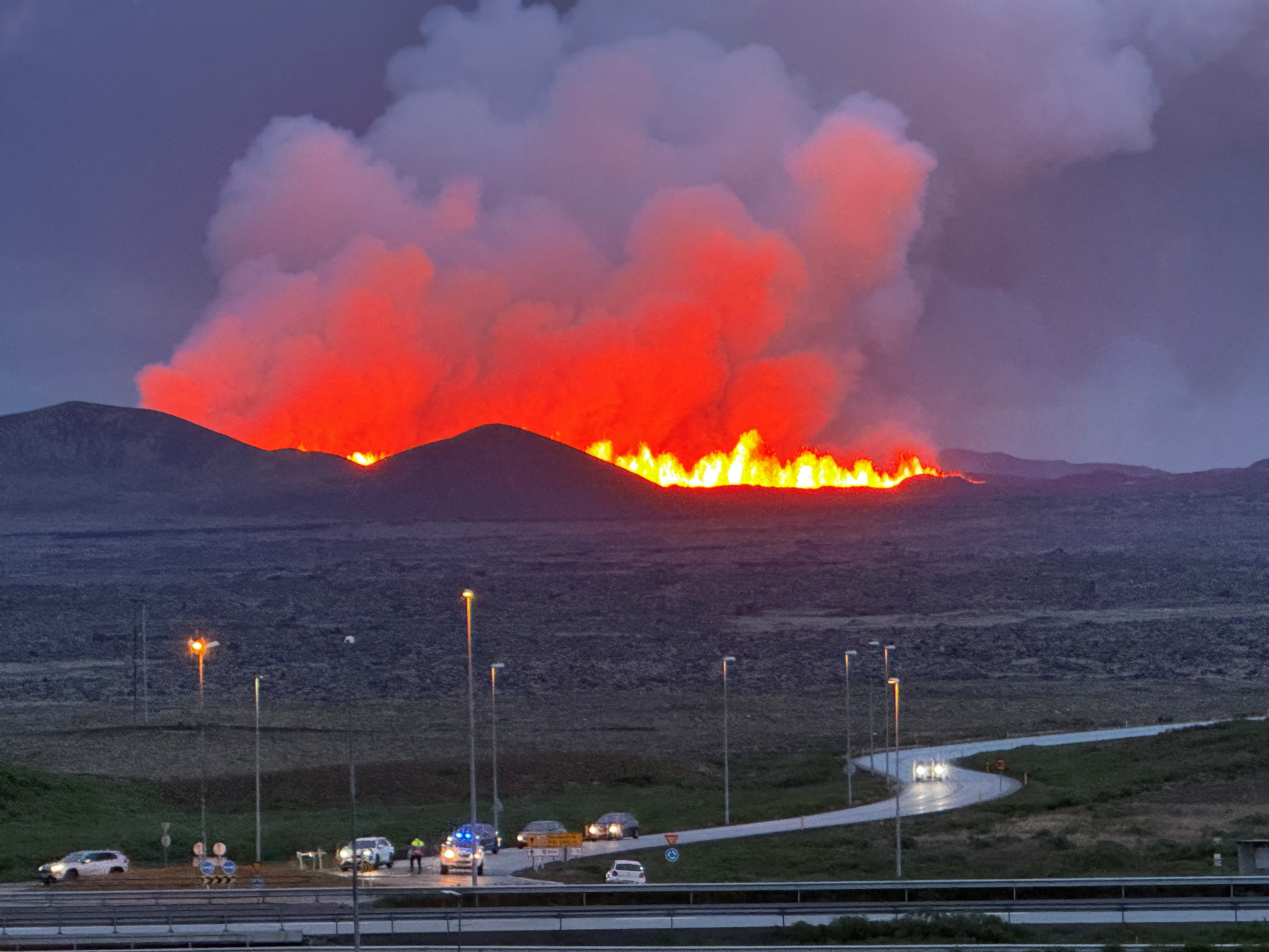 A volcano erupts, near Vogar, Iceland, August 22, 2024 in this picture obtained from social media.