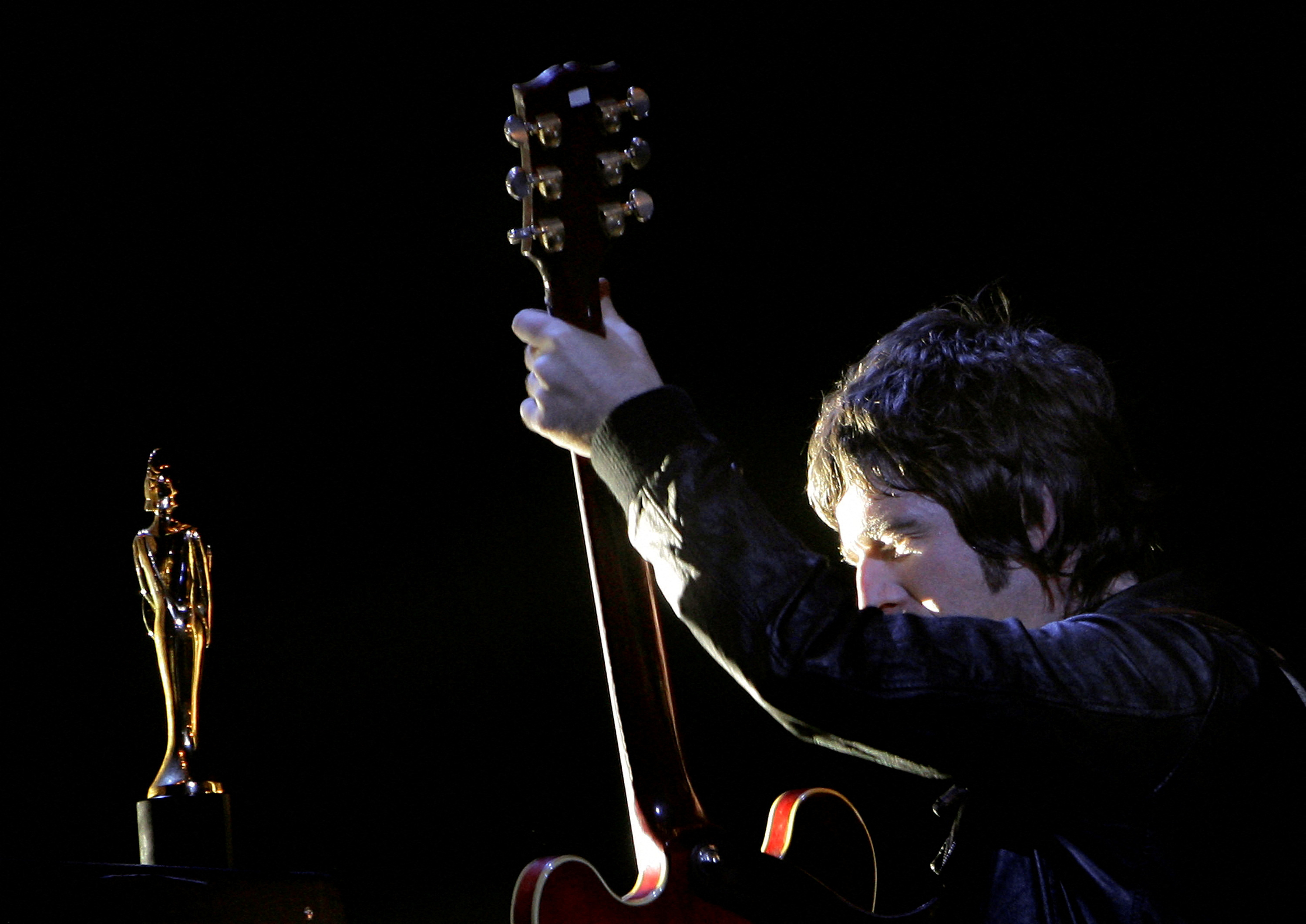 FILE PHOTO: Noel Gallagher of Oasis performs at the Brit Awards in London