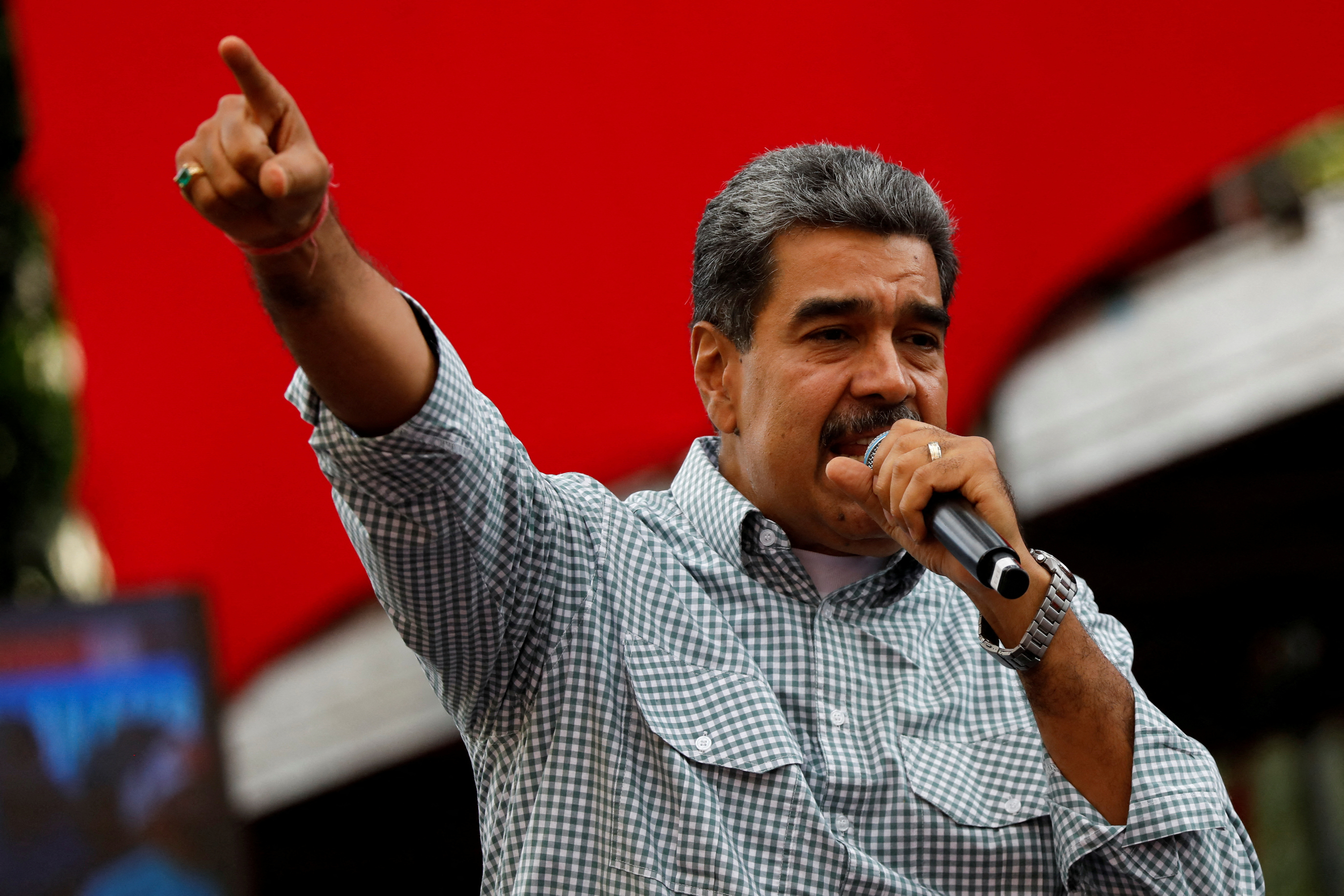 FILE PHOTO: Venezuelan President Nicolas Maduro delivers a speech