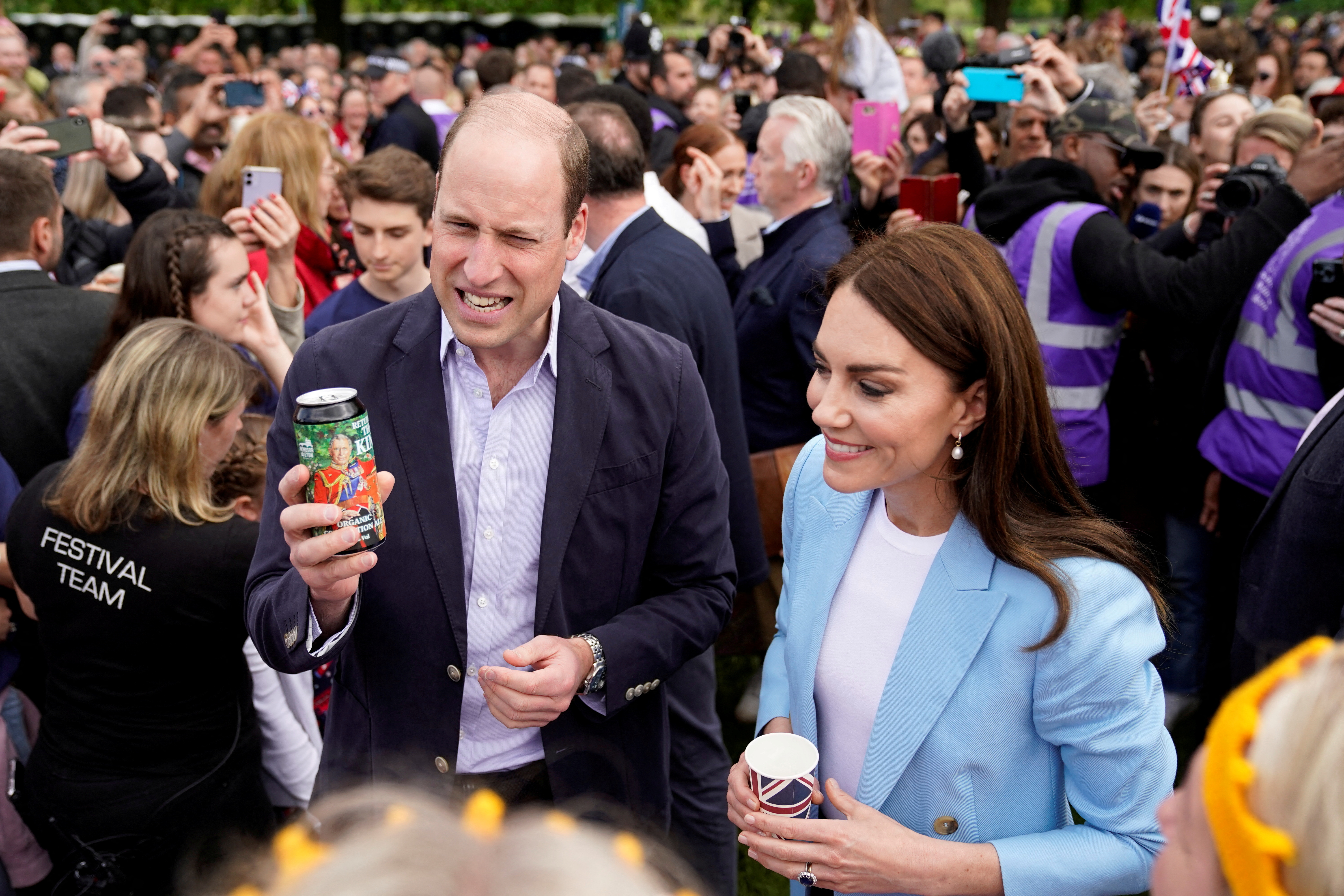 FILE PHOTO: Britain's Prince William and Catherine, Princess of Wales greet well-wishers along the Long Walk outside Windsor Castle