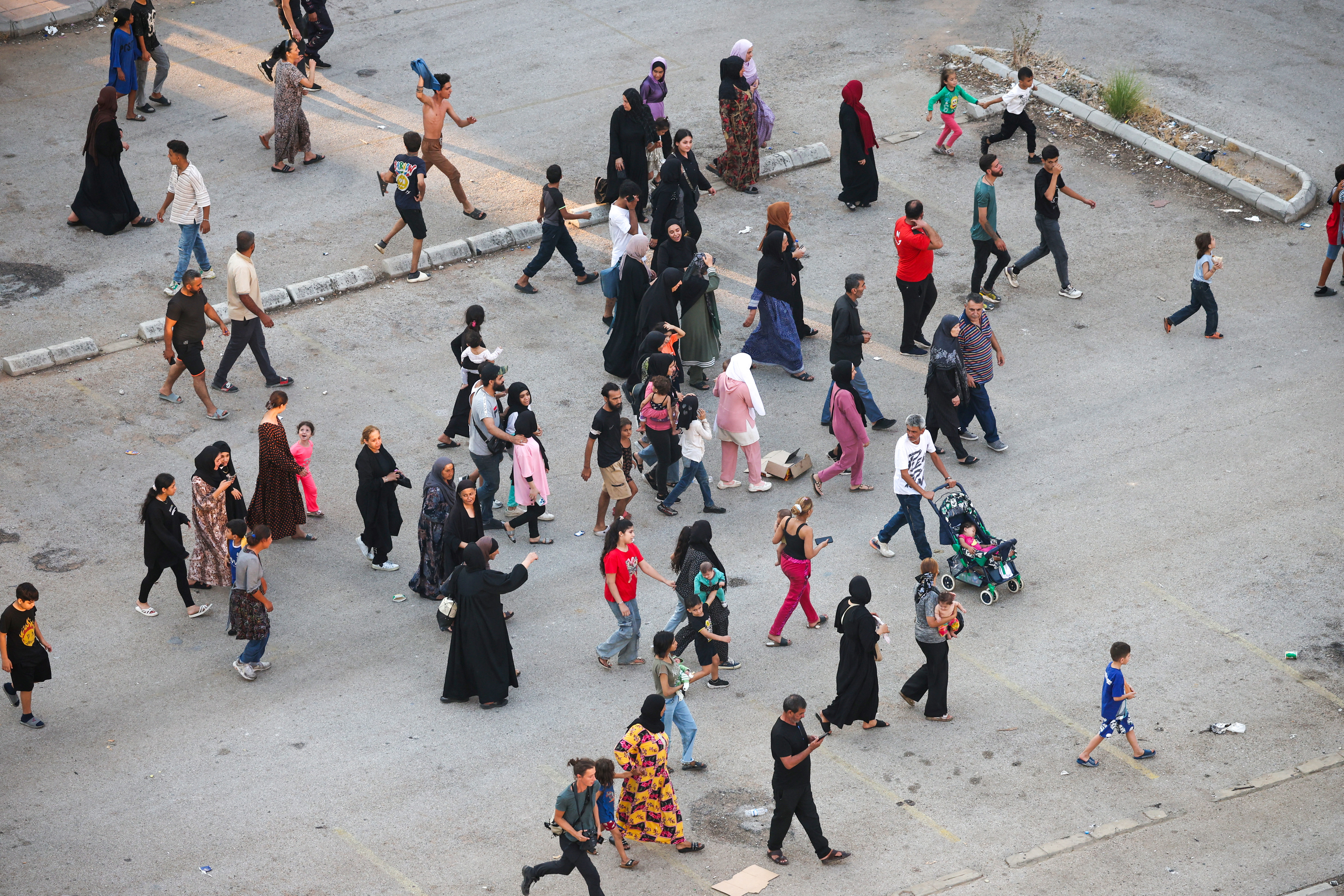People react to the  death of Lebanon's Hezbollah leader Sayyed Hassan Nasrallah, in Beirut