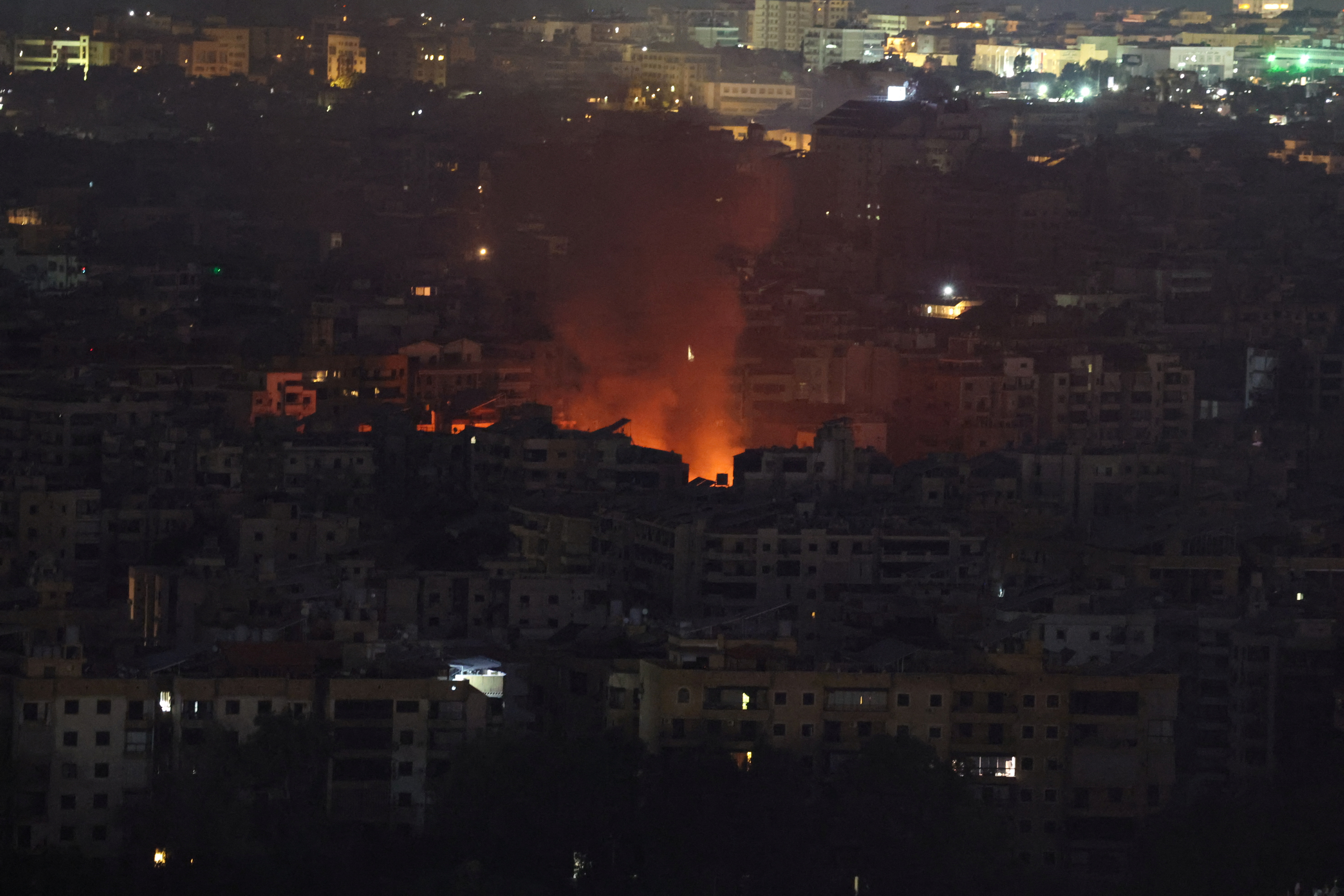 Smoke billows over Beirut's southern suburbs, amid ongoing hostilities between Hezbollah and Israeli forces