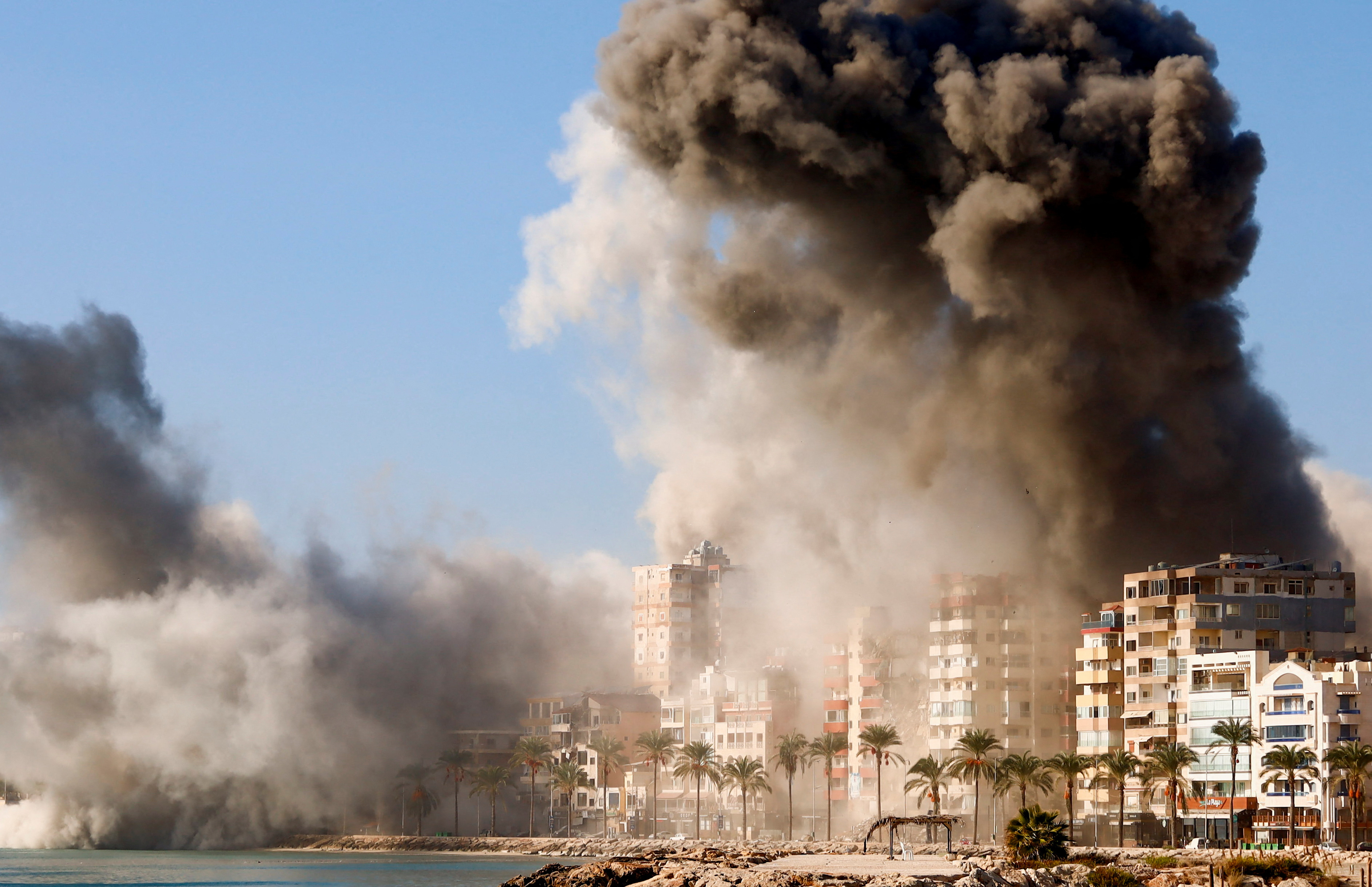 Smoke billows over the UNESCO-listed port city of Tyre after Israeli strikes