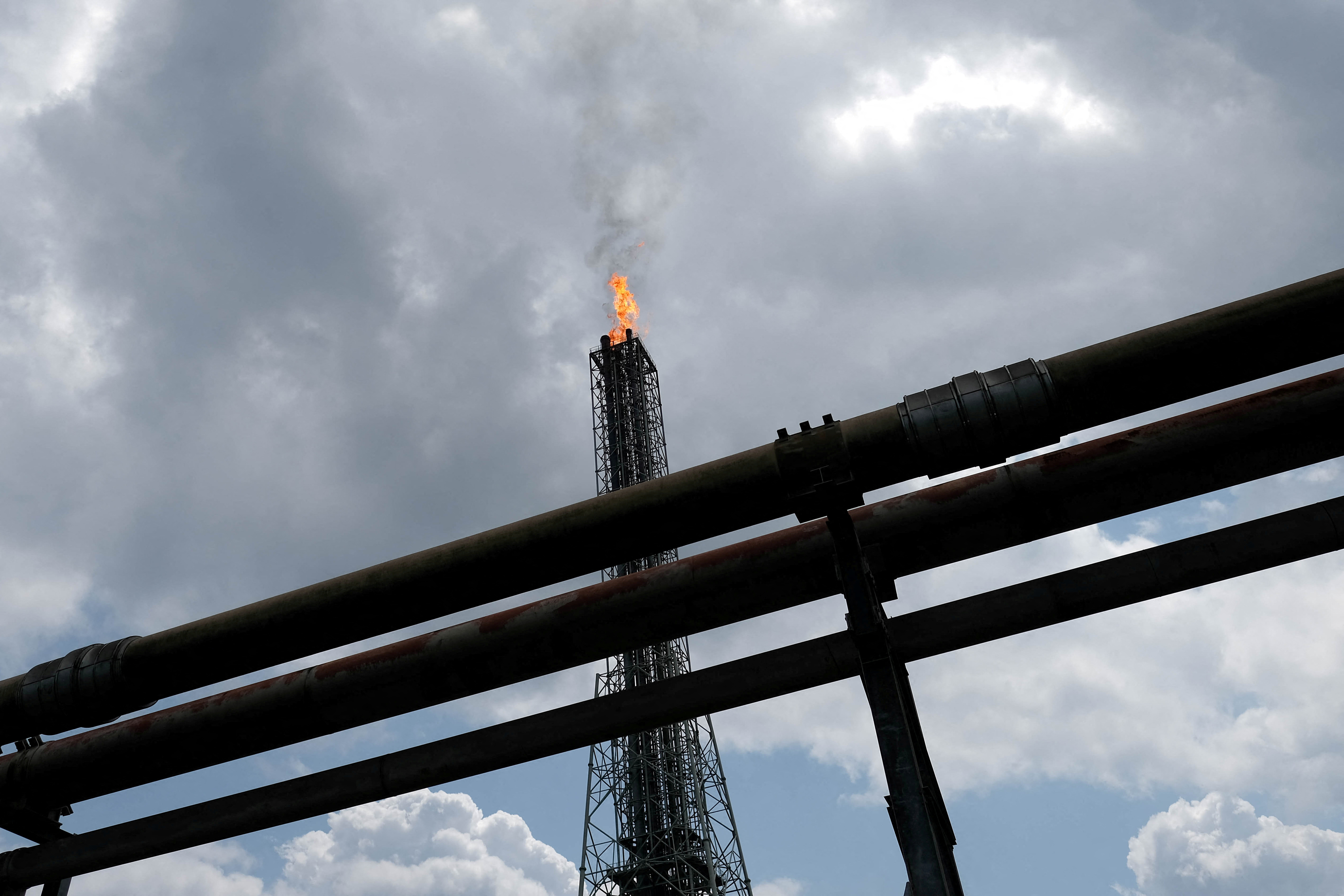 FILE PHOTO: A view shows a tower flaring gas at an LNG processing plant operated by Shell and others in Bonny Island