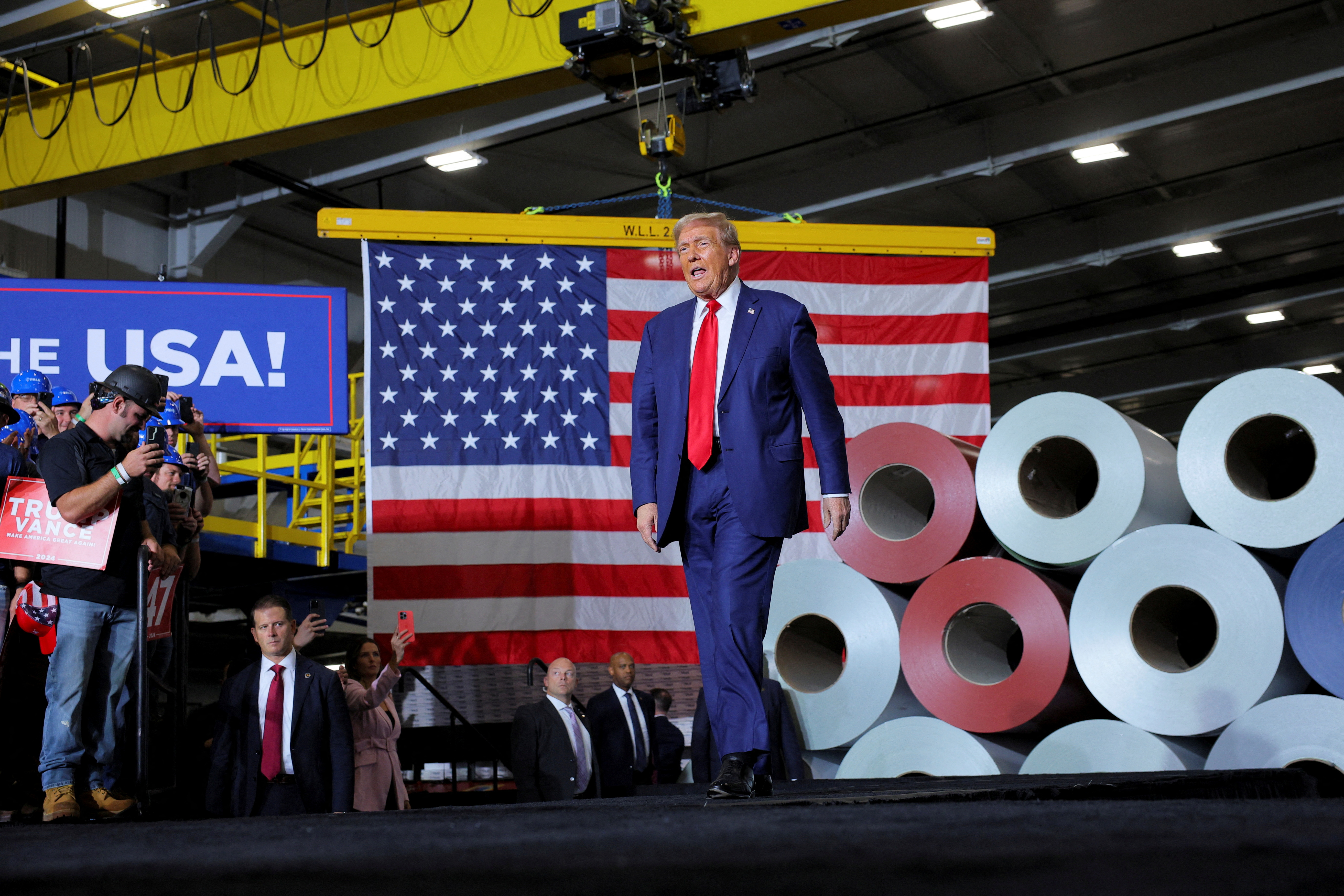 FILE PHOTO: Republican presidential nominee and former U.S. President Donald Trump visits manufacturer FALK Production in Walker