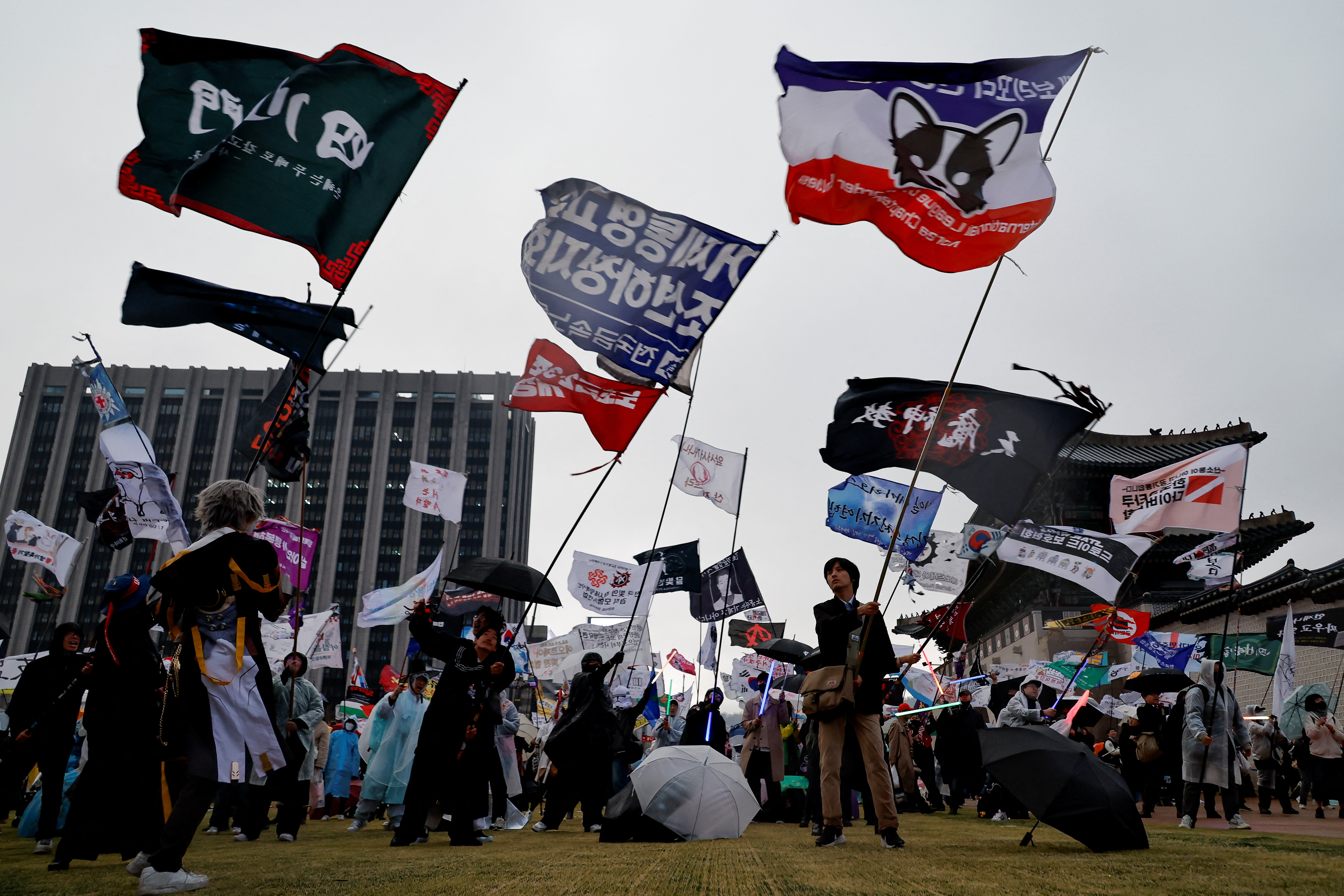 People attend a rally to celebrate the expulsion of South Korean President Yoon Suk Yeol in Seoul