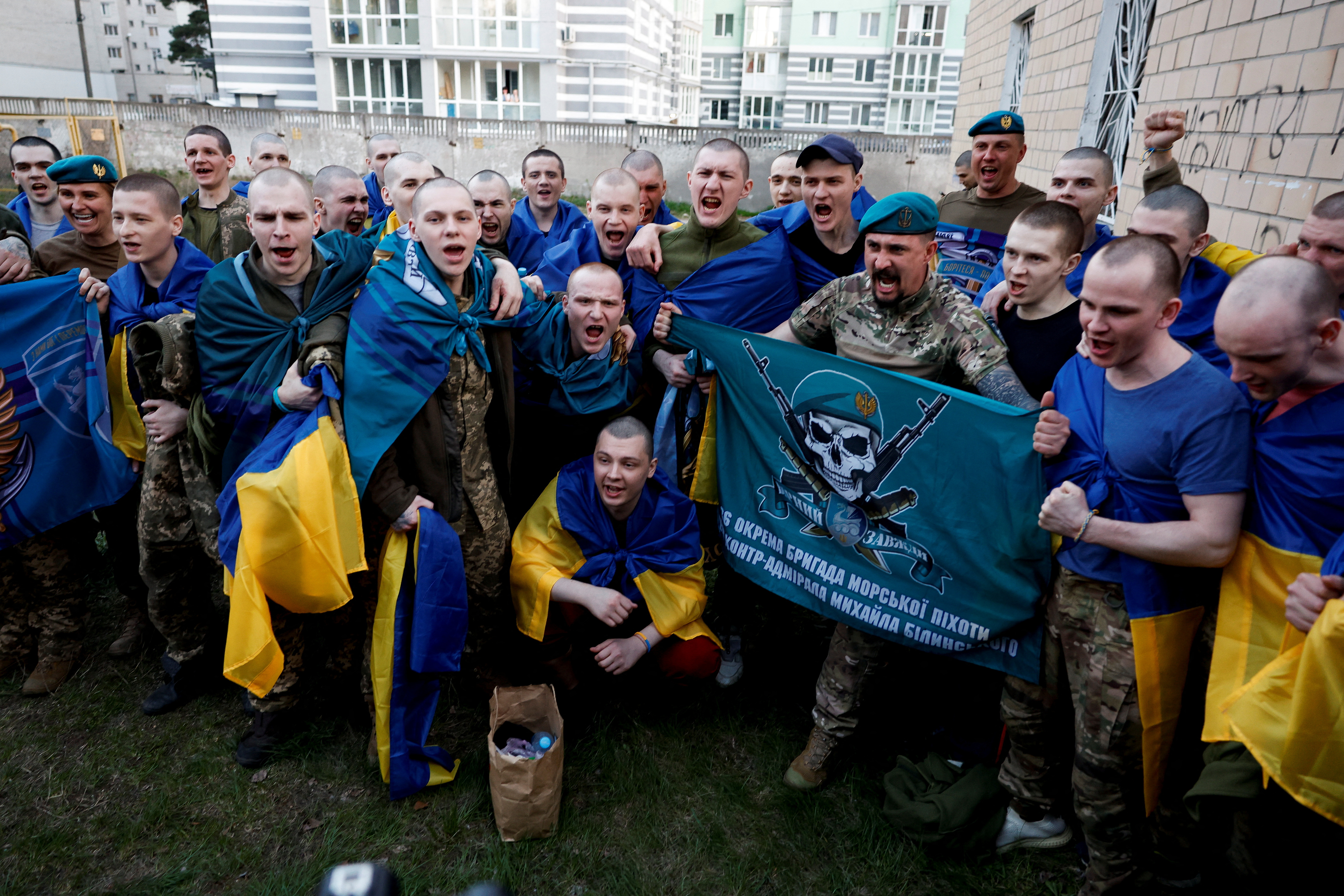 Ukrainian prisoners of war (POWs) return after a swap, at an undisclosed location