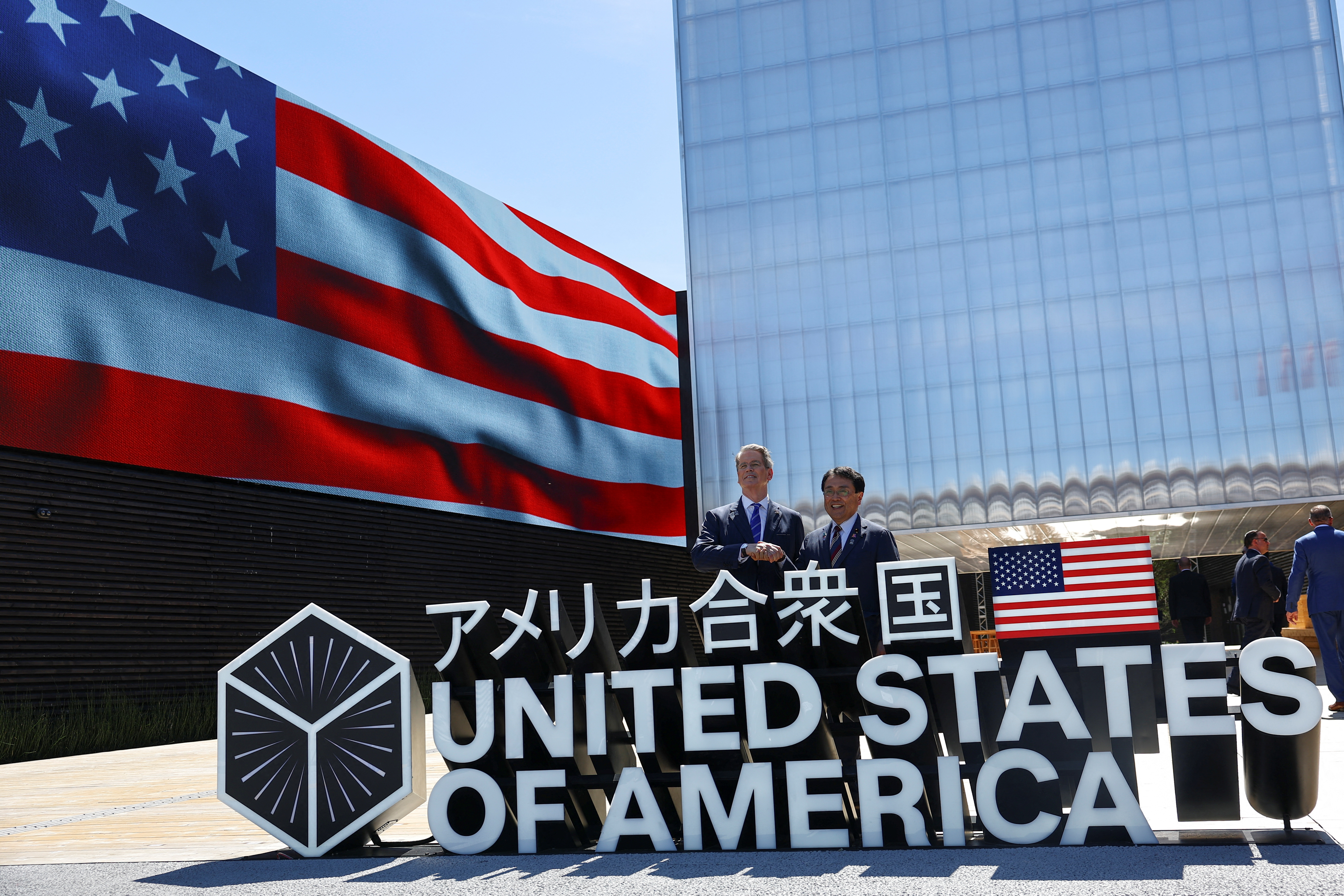 U.S. Secretary of the Treasury Scott Bessent and Japan's Economic Revitalization Minister Ryosei Akazawa shake hands on the day they visit U.S. pavilion at Expo 2025 in Osaka, Japan, July 19, 2025. REUTERS/Kim Kyung-Hoon