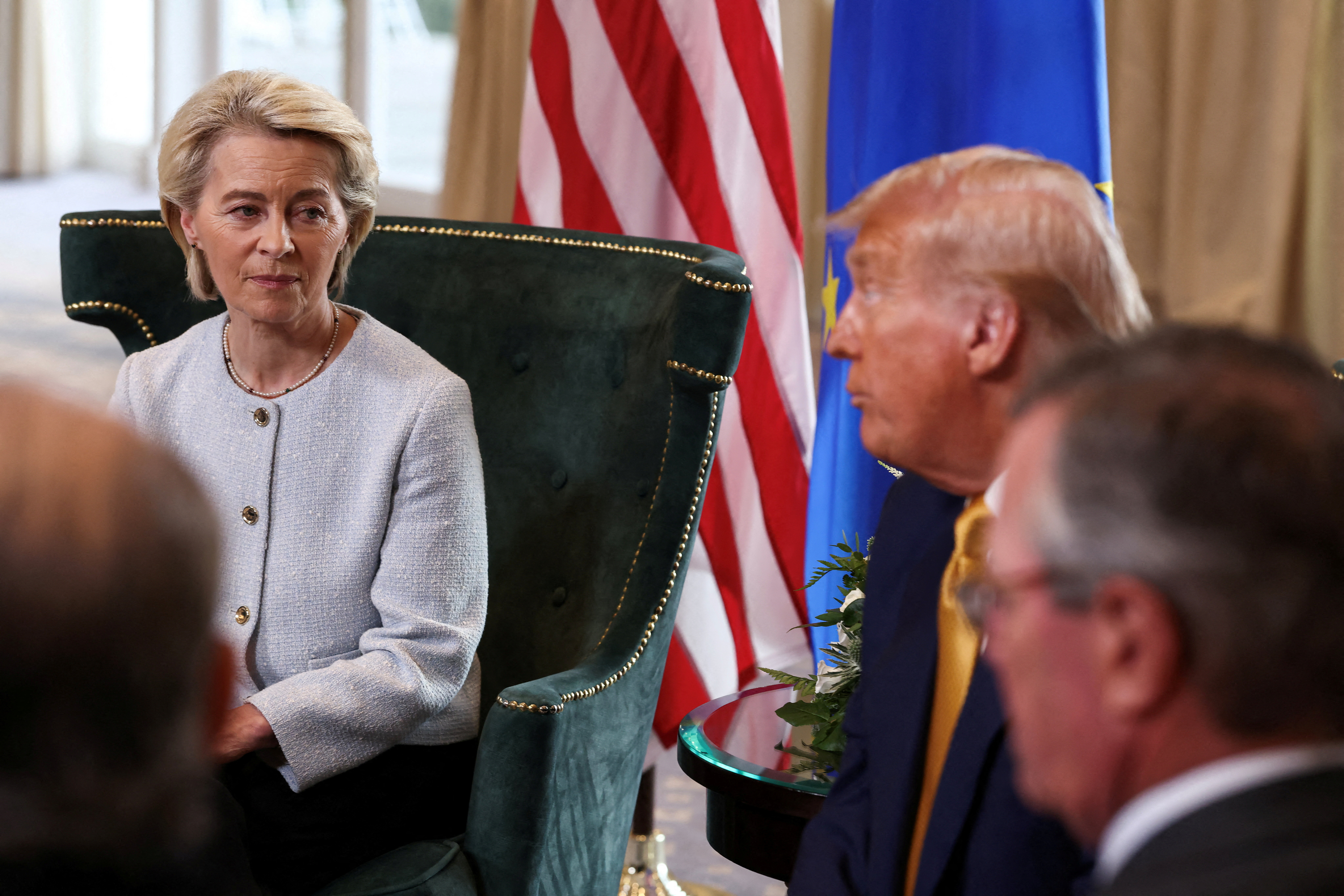 FILE PHOTO: European Commission President Ursula von der Leyen sits with U.S. President Donald Trump, after the announcement of a trade deal between the U.S. and EU, in Turnberry, Scotland, Britain, July 27, 2025. REUTERS/Evelyn Hockstein/File Photo