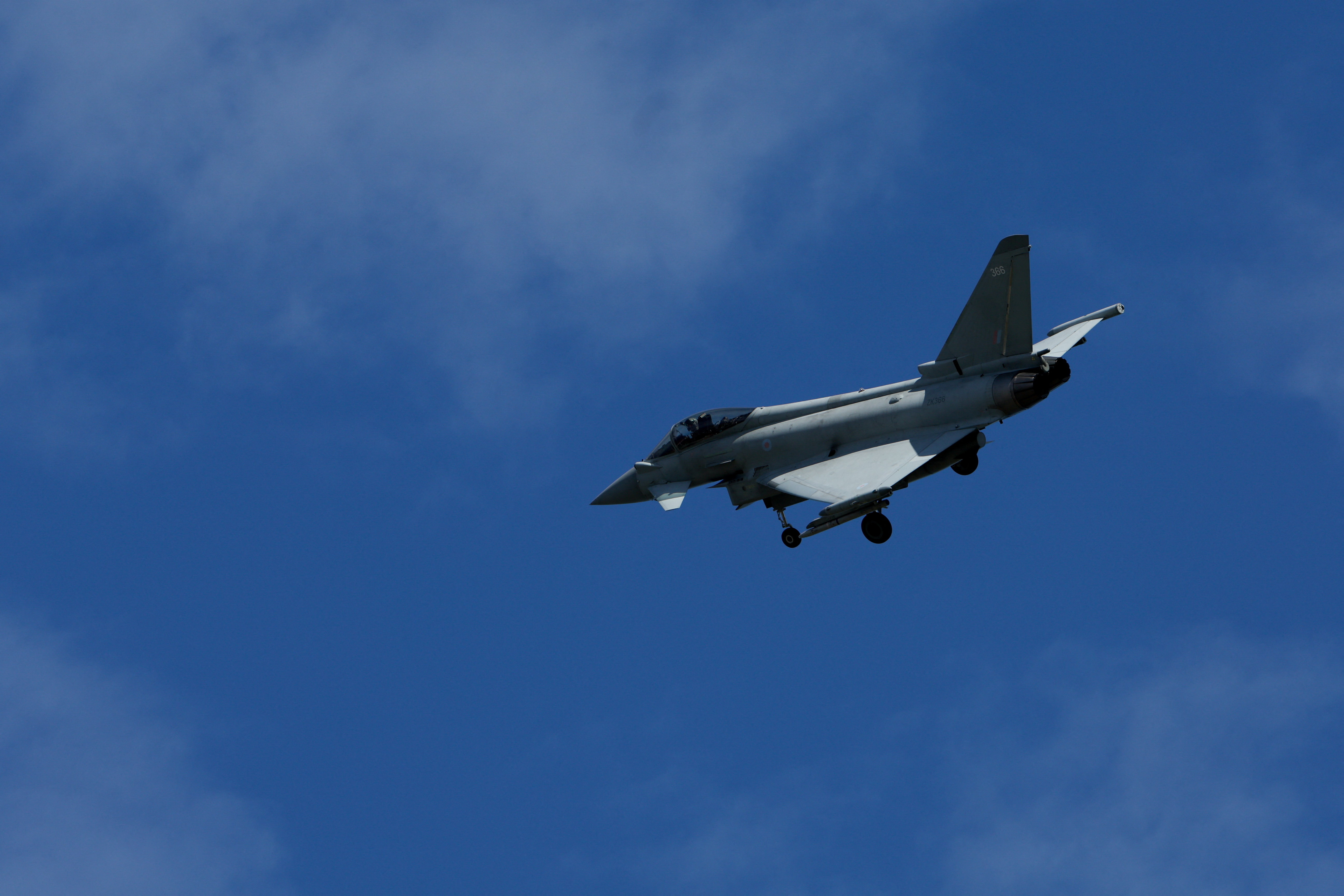 An RAF Typhoon fighter jet flies ahead of U.S. President Donald Trump's departure to Washington, D.C., in Lossiemouth, Scotland, Britain, July 29, 2025.