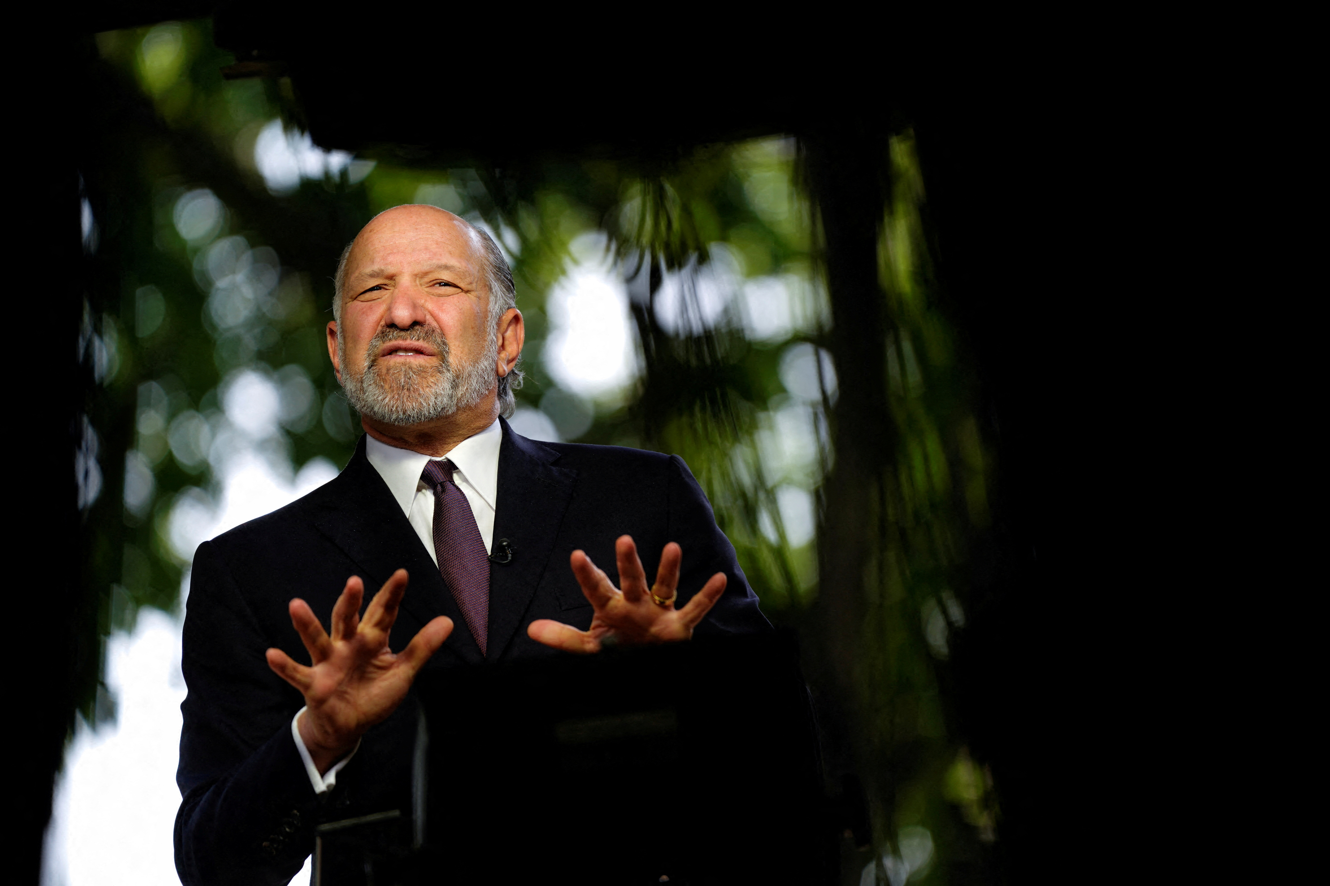 FILE PHOTO: U.S. Secretary of Commerce Howard Lutnick attends an interview, outside the White House