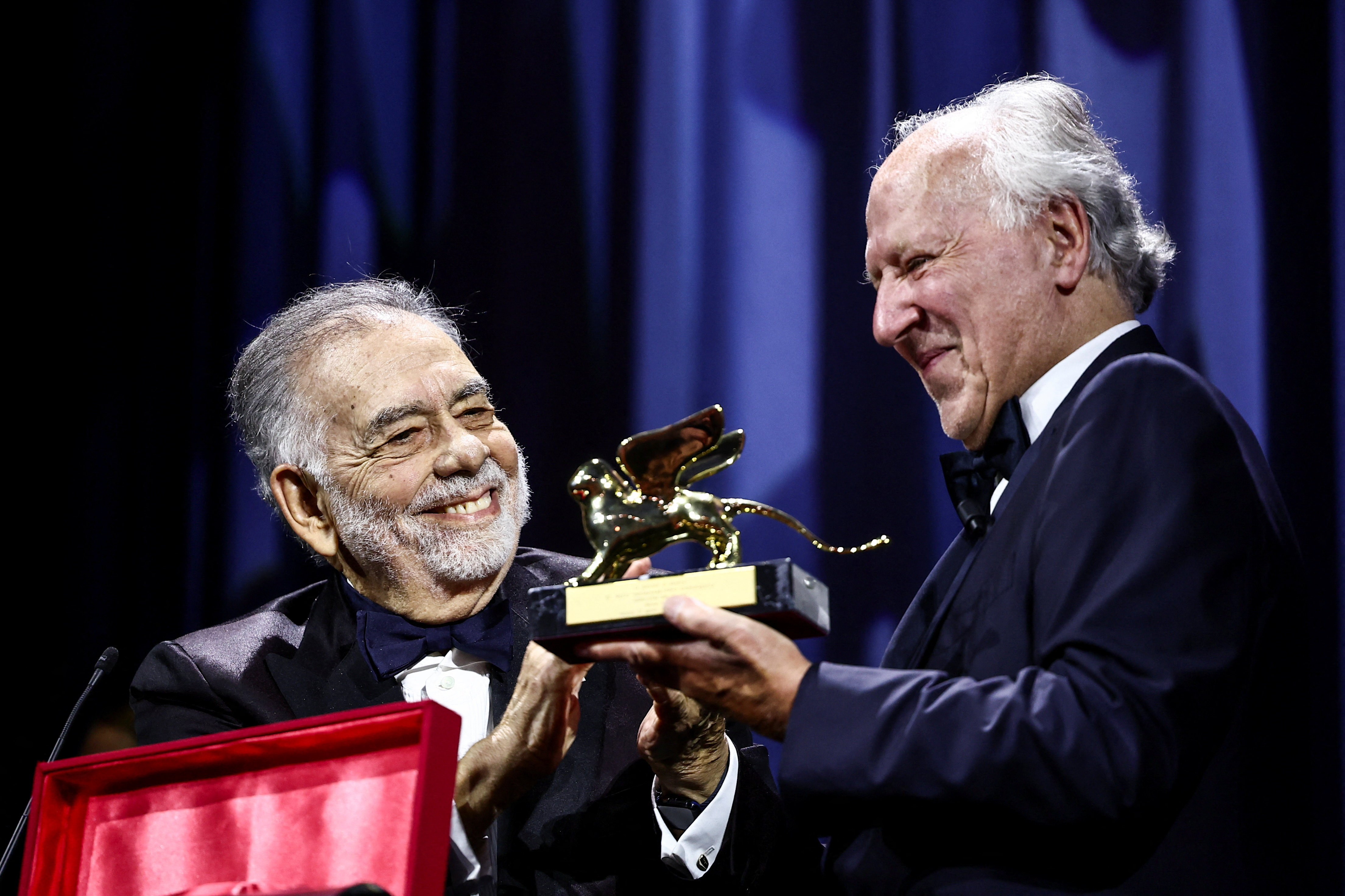 German filmmaker Werner Herzog receives the Golden Lion for Lifetime Achievement from Francis Ford Coppola, during the opening ceremony of the 82nd Venice Film Festival, in Venice, Italy, August 27, 2025.