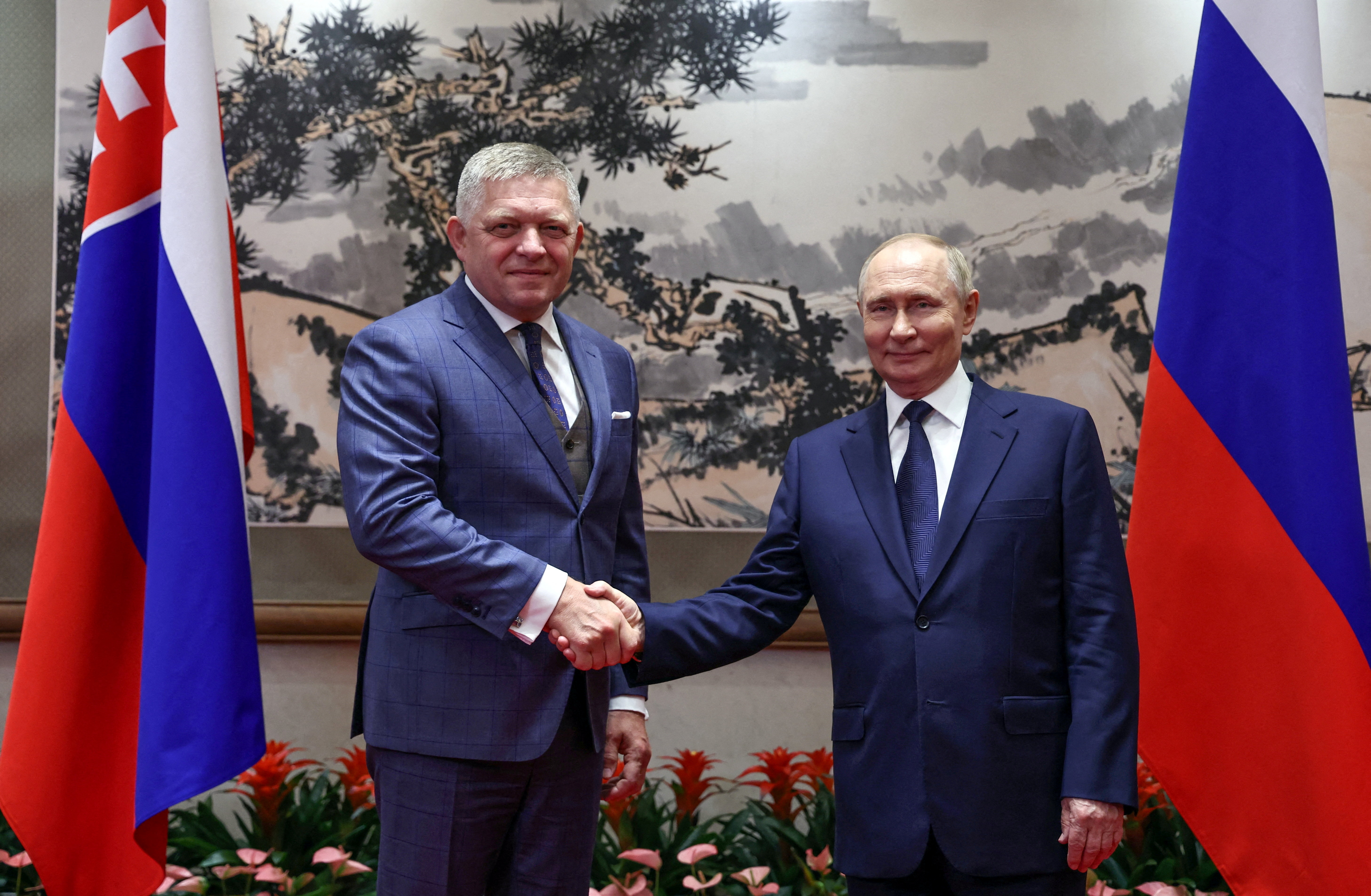 Russian President Vladimir Putin and Slovak Prime Minister Robert Fico.