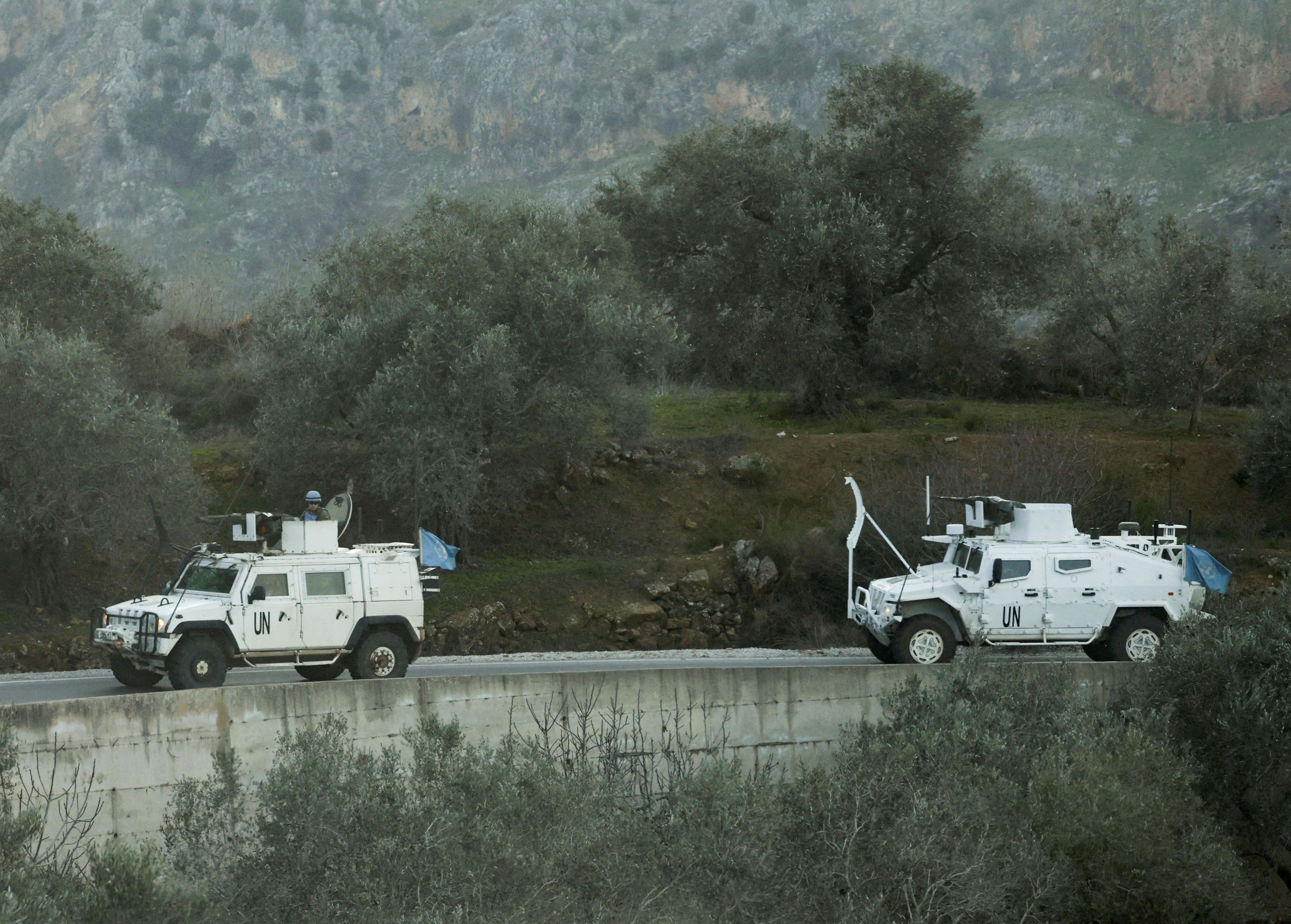 UN peacekeepers (UNIFIL) vehicles ride along a street in Marjaayoun, Southern Lebanon January 20, 2025.
