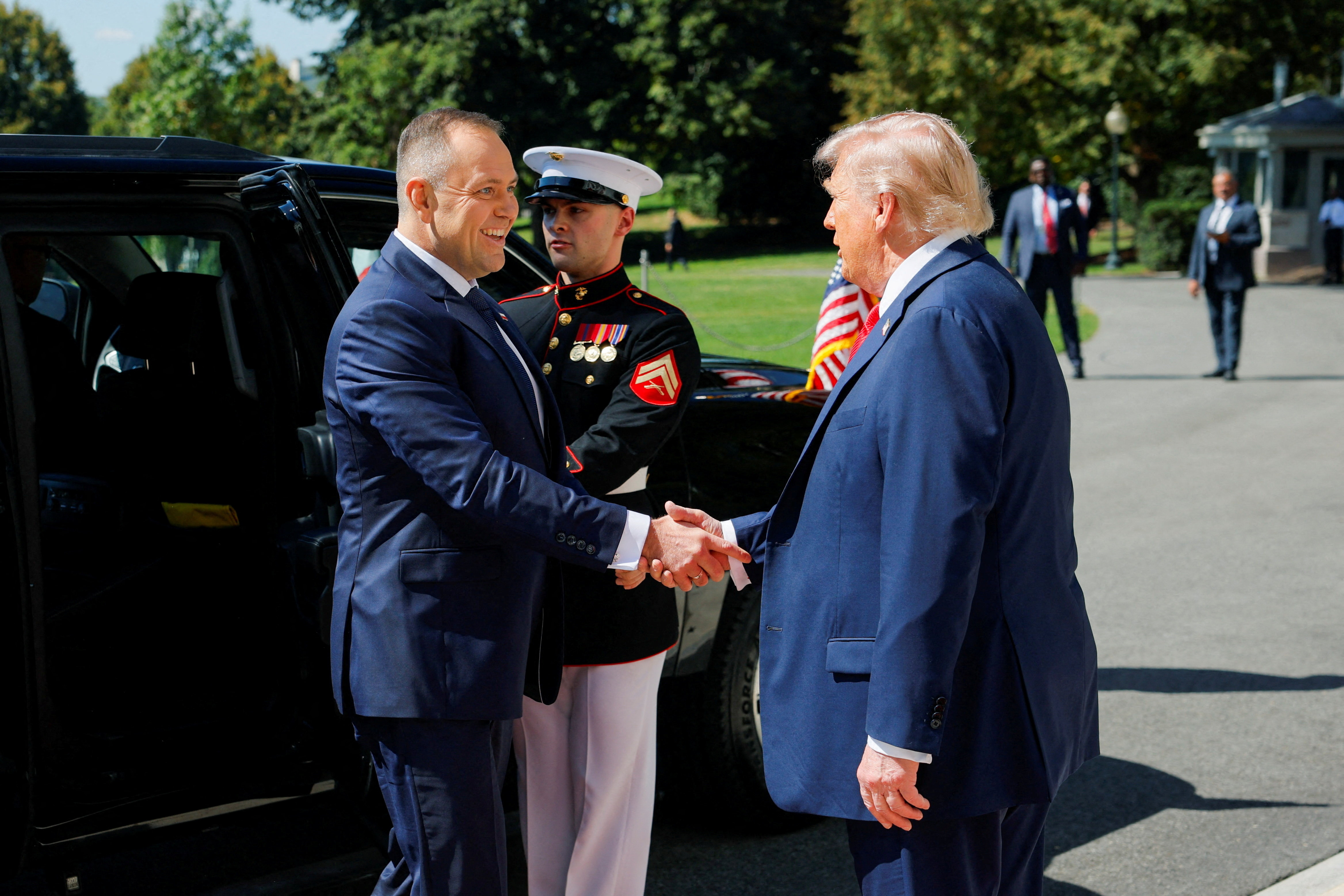U.S. President Donald Trump greets the President of Poland Karol Nawrocki at the White House in Washington, D.C., U.S., September 3, 2025.