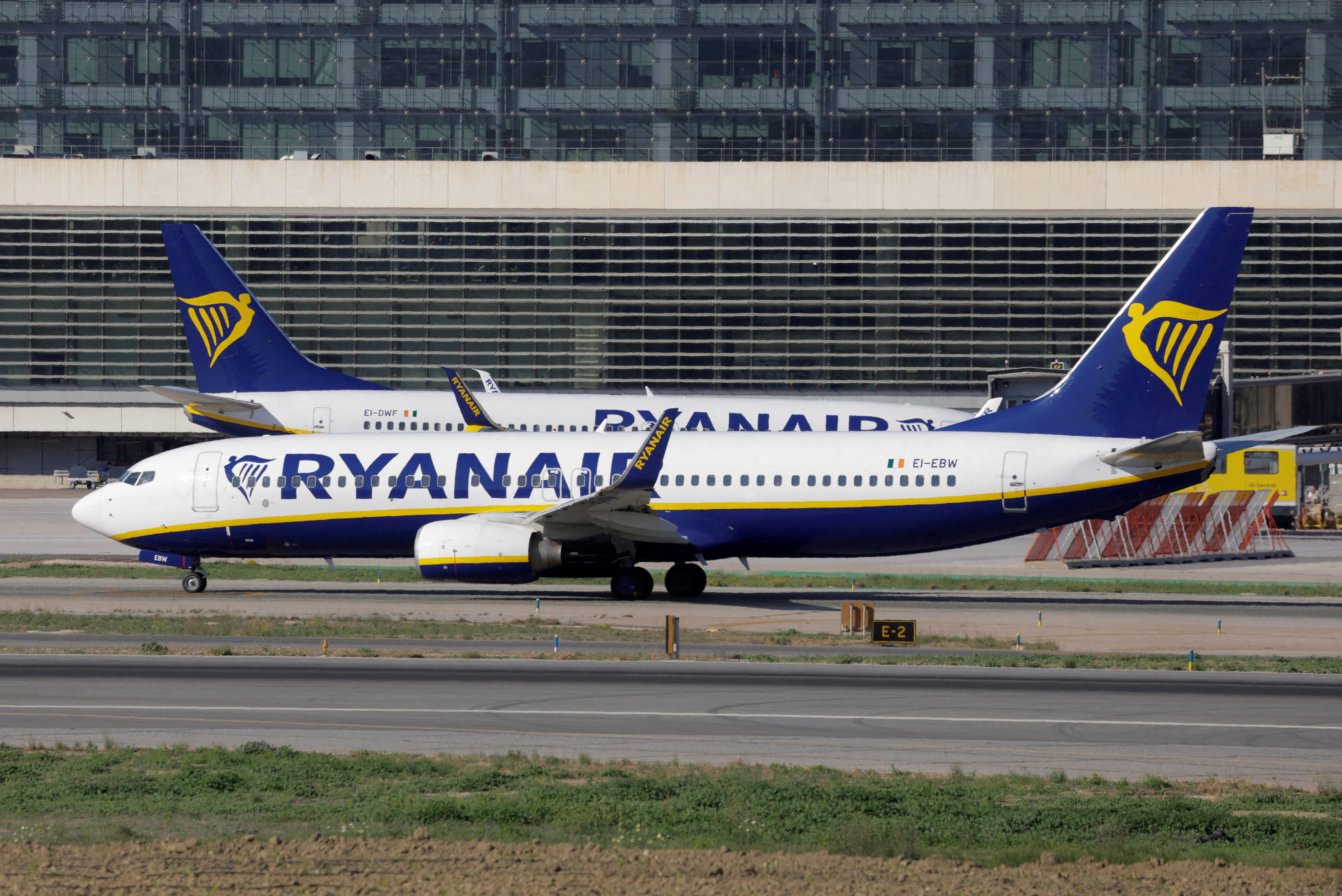 Two Boeing 737-8AS passenger aircrafts of Ryanair airline, taxi on a runway at Malaga-Costa del Sol airport, in Malaga, Spain, May 3, 2024.