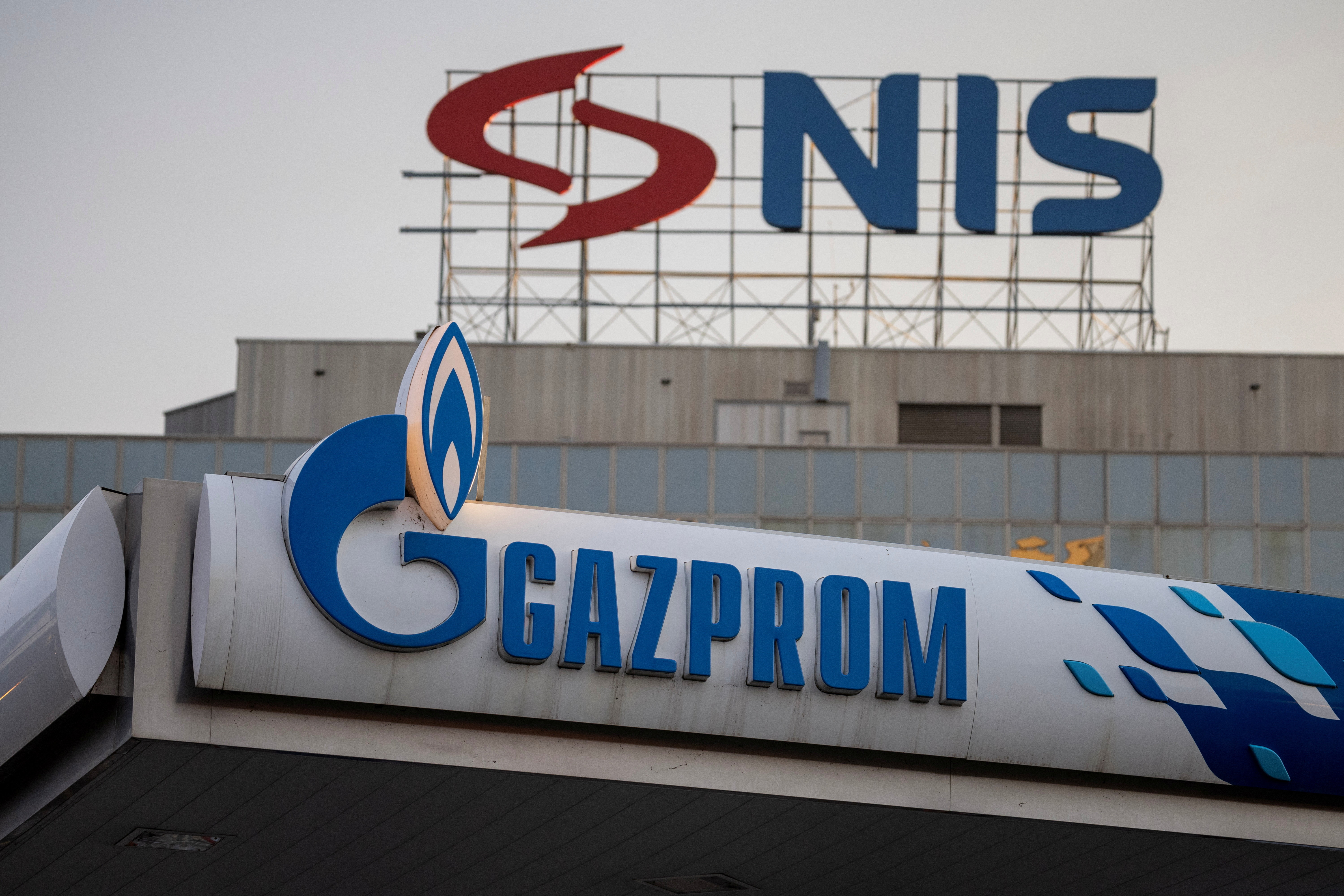 Signages display the logos of NIS as well as Russian oil producer Gazprom Neft, in Belgrade, Serbia October 8, 2025. REUTERS/Marko Djurica