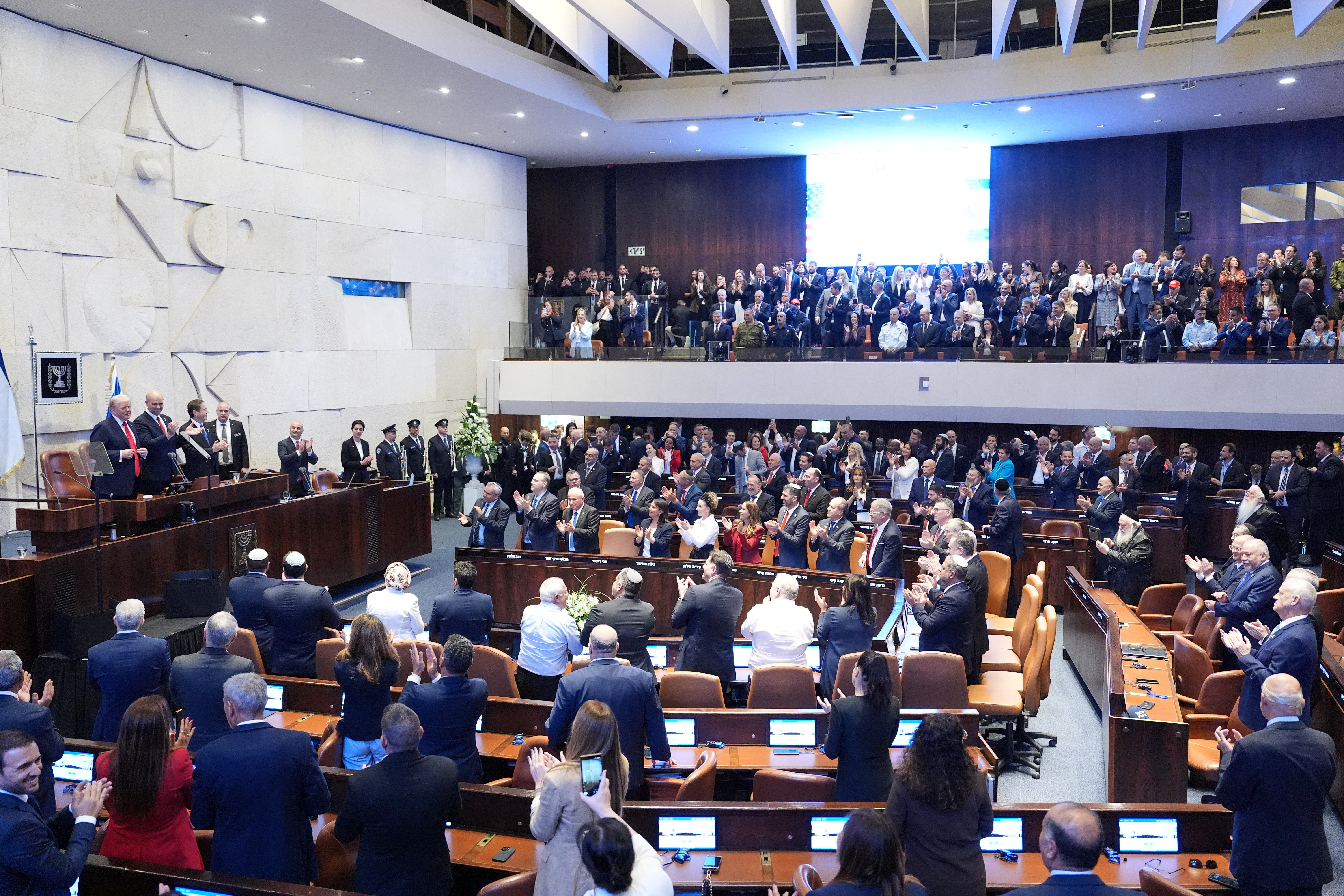 President Donald Trump receives a stand ovation as he arrives to speak to the Knesset, Monday, Oct. 13, 2025, in Jerusalem.