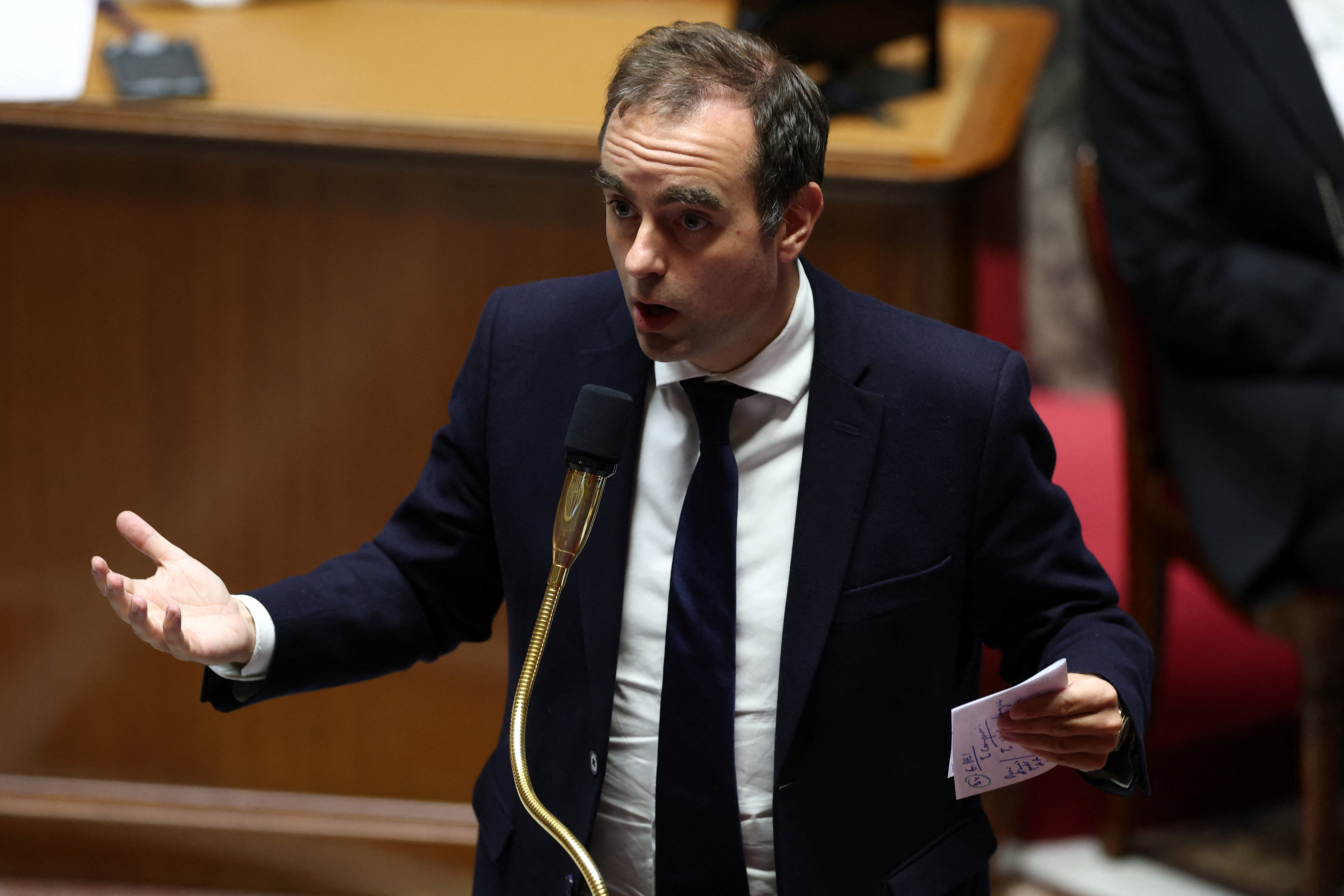 French Prime Minister Sebastien Lecornu gestures as he speaks during a debate following his first general policy speech in front of the parliament and the new government at the National Assembly in Paris, France, October 14, 2025. REUTERS/Gonzalo Fuentes