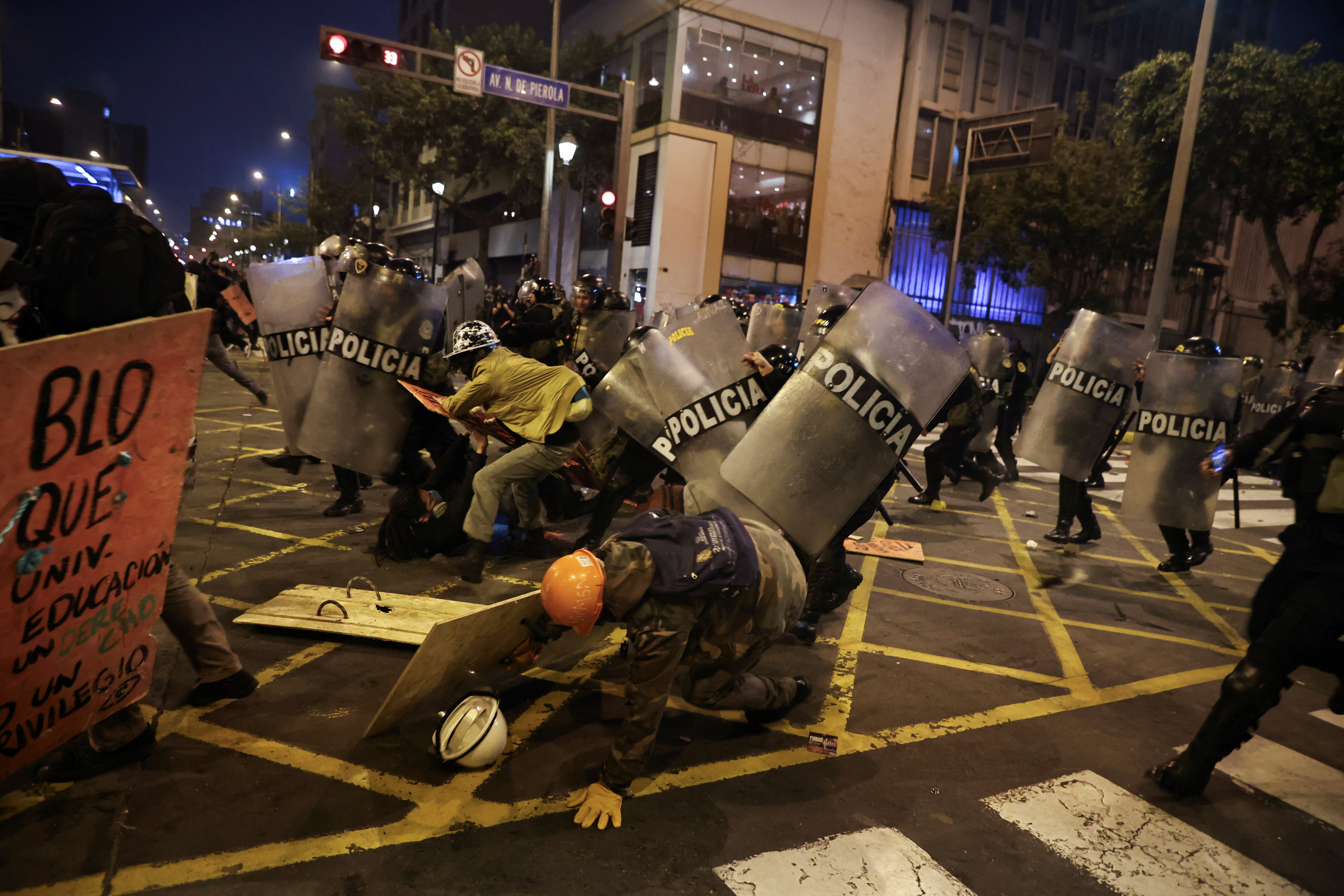 Demonstrators clash with riot police officers during a protest against rising crime, economic insecurity, and corruption, a day after President Jose Jeri presented his cabinet,