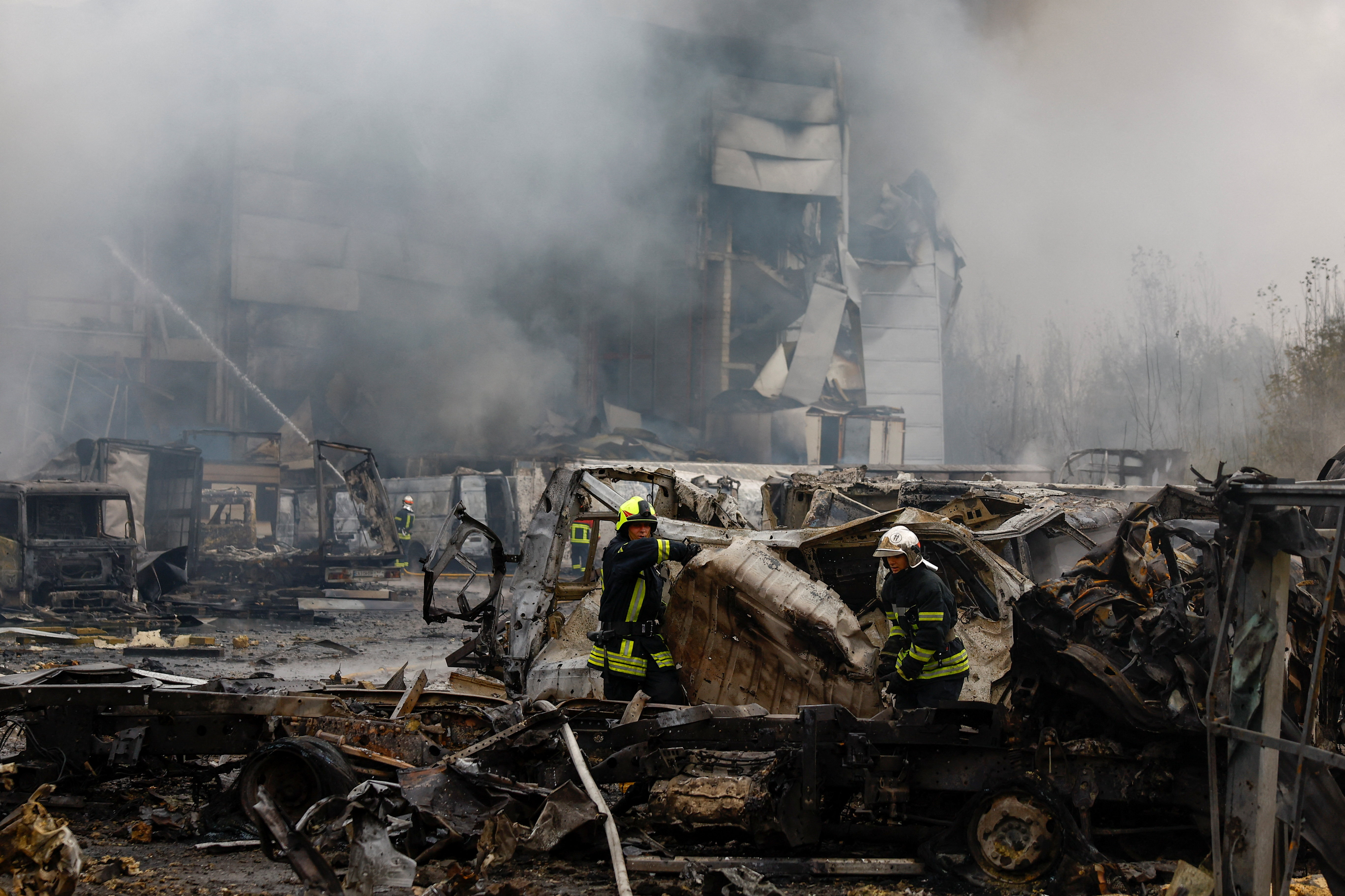Firefighters work at the site of food warehouses hit by an overnight Russian missile strike, amid Russia’s attack on Ukraine, in Kyiv, Ukraine October 25, 2025. REUTERS/Valentyn Ogirenko