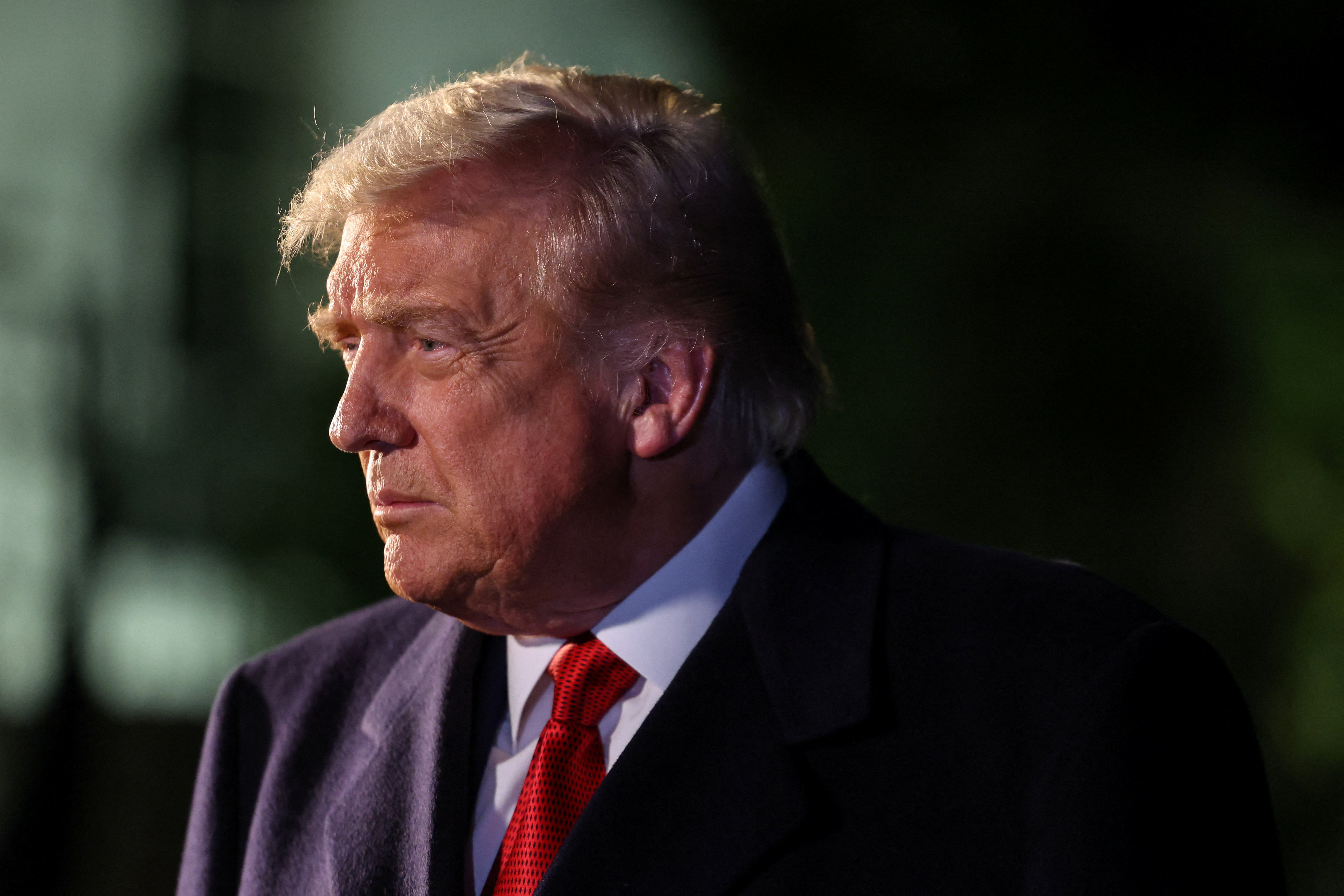 U.S. President Donald Trump speaks to members of the media as he departs for Asia from the South Lawn of the White House in Washington, D.C., U.S., October 24, 2025. REUTERS/Kylie Cooper