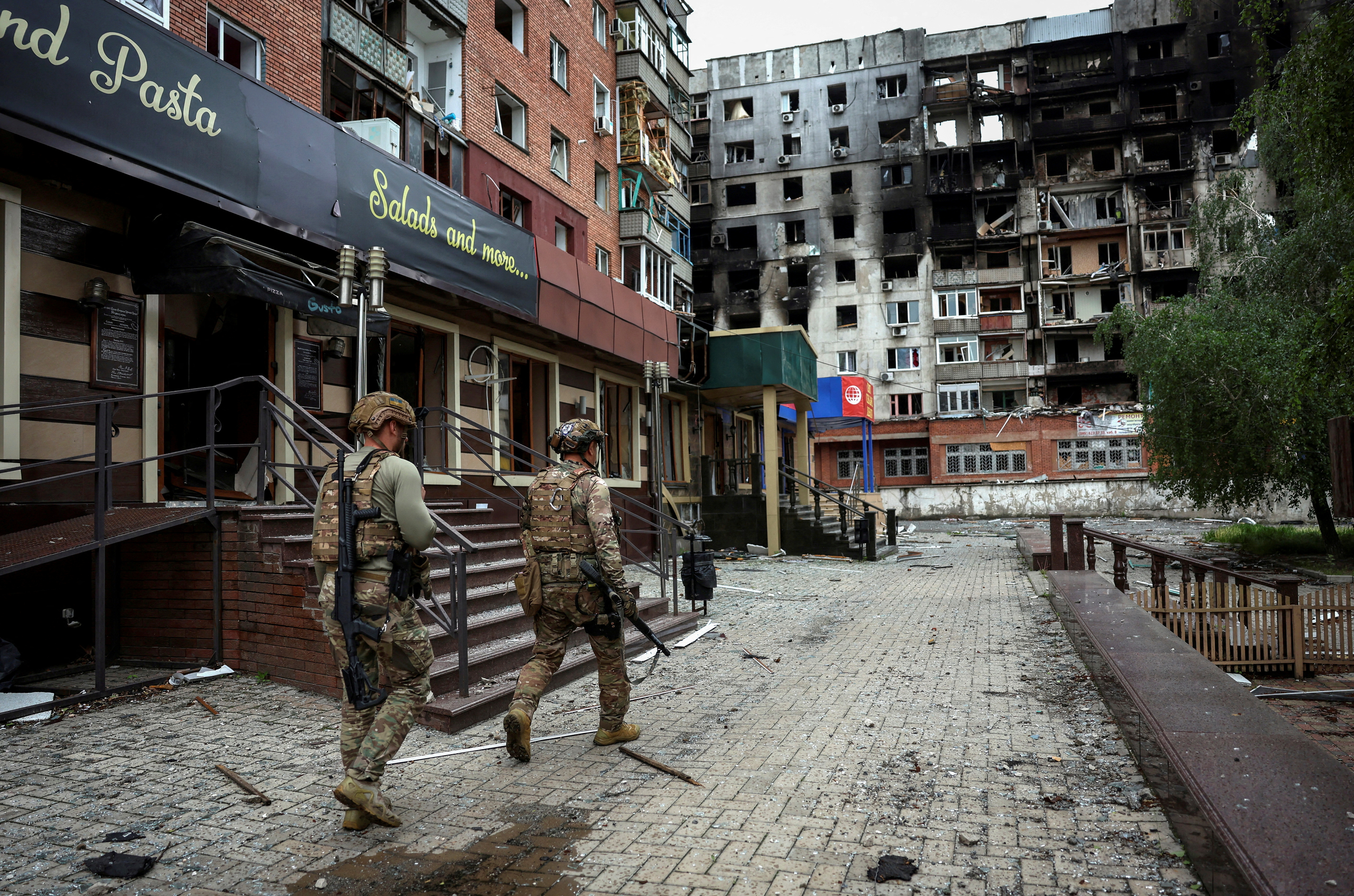 Members of the White Angel unit of Ukrainian police officers who evacuate people from the frontline towns and villages
