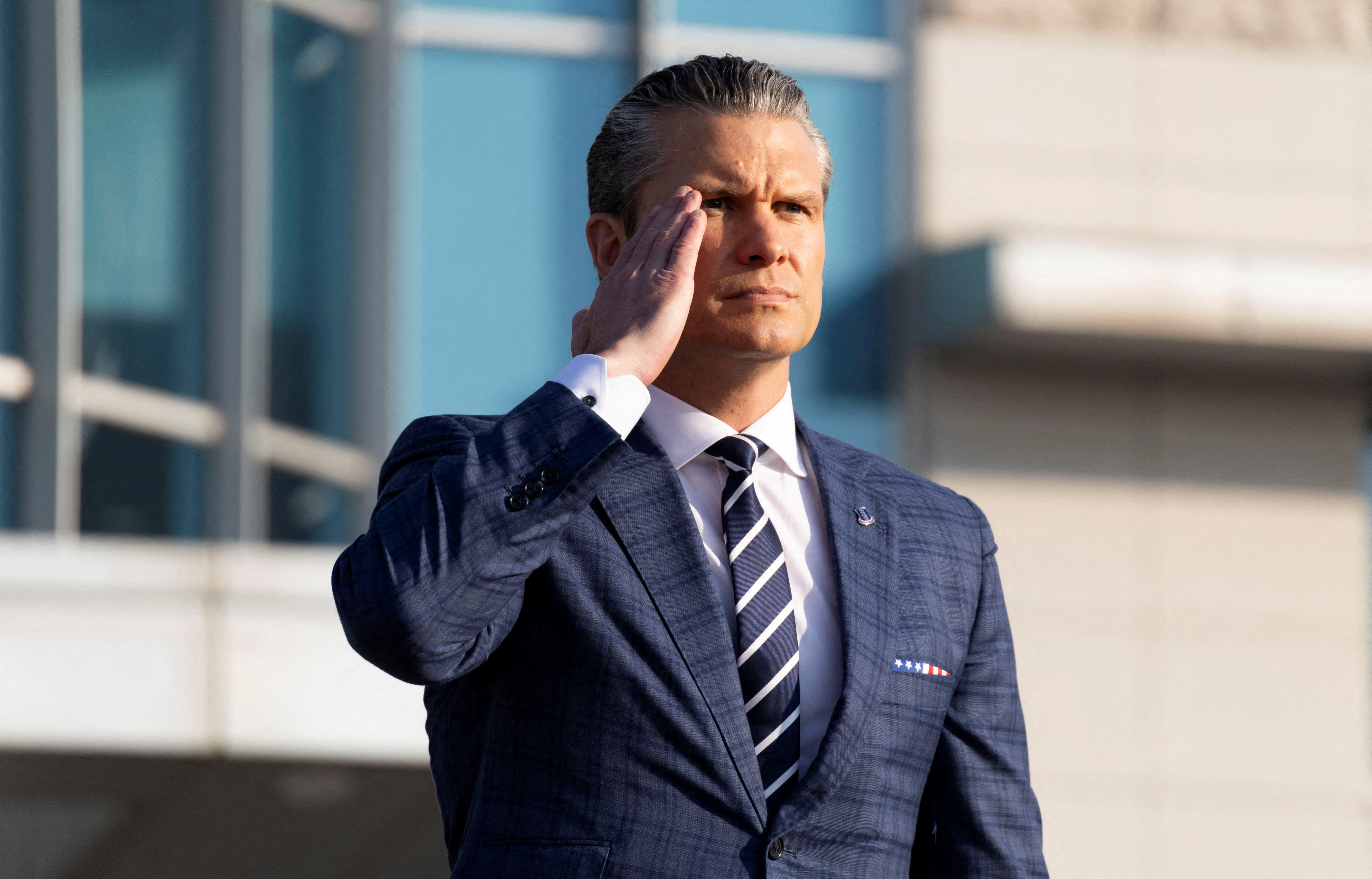 US Defense Secretary Pete Hegseth, salutes as he inspect a guard of honor during a welcoming ceremony prior to the 57rd Security Consultative Meeting (SCM) at the defense ministry in Seoul