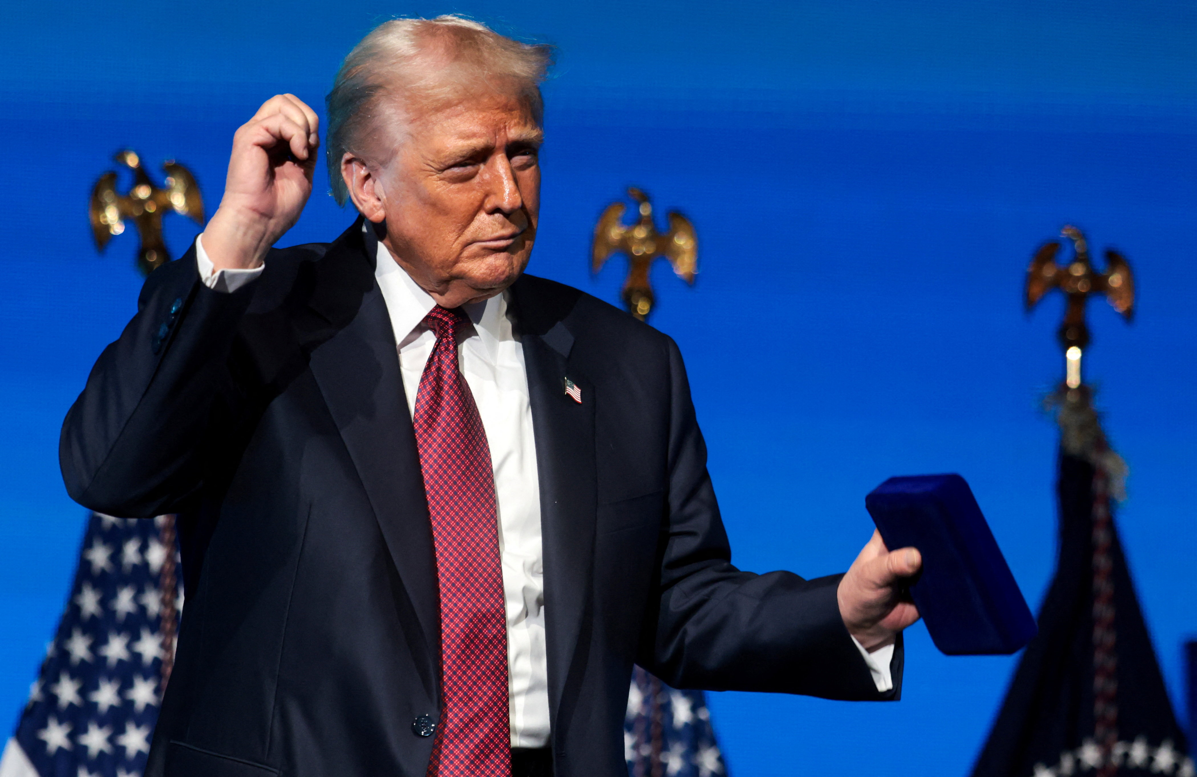 U.S. President Donald Trump dances on stage during the American Business Forum Miami at the Kaseya Center Arena in Miami, Florida, U.S. November 5, 2025. REUTERS/Jonathan Ernst