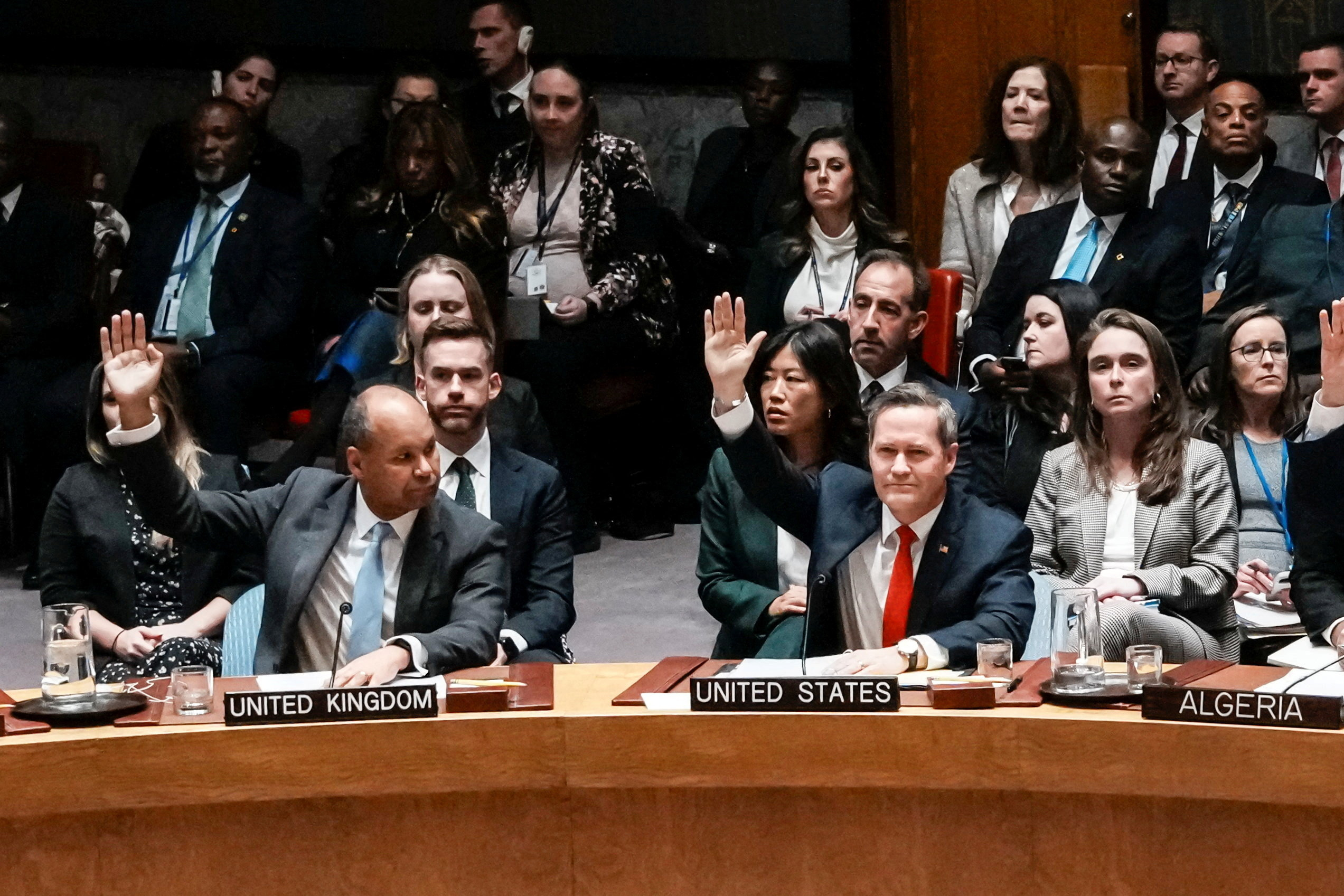 James Kariuki vote in favor for a resolution during a meeting of the United Nations Security Council to consider a U.S. proposal for a U.N. mandate to establish an international stabilization force in Gaza