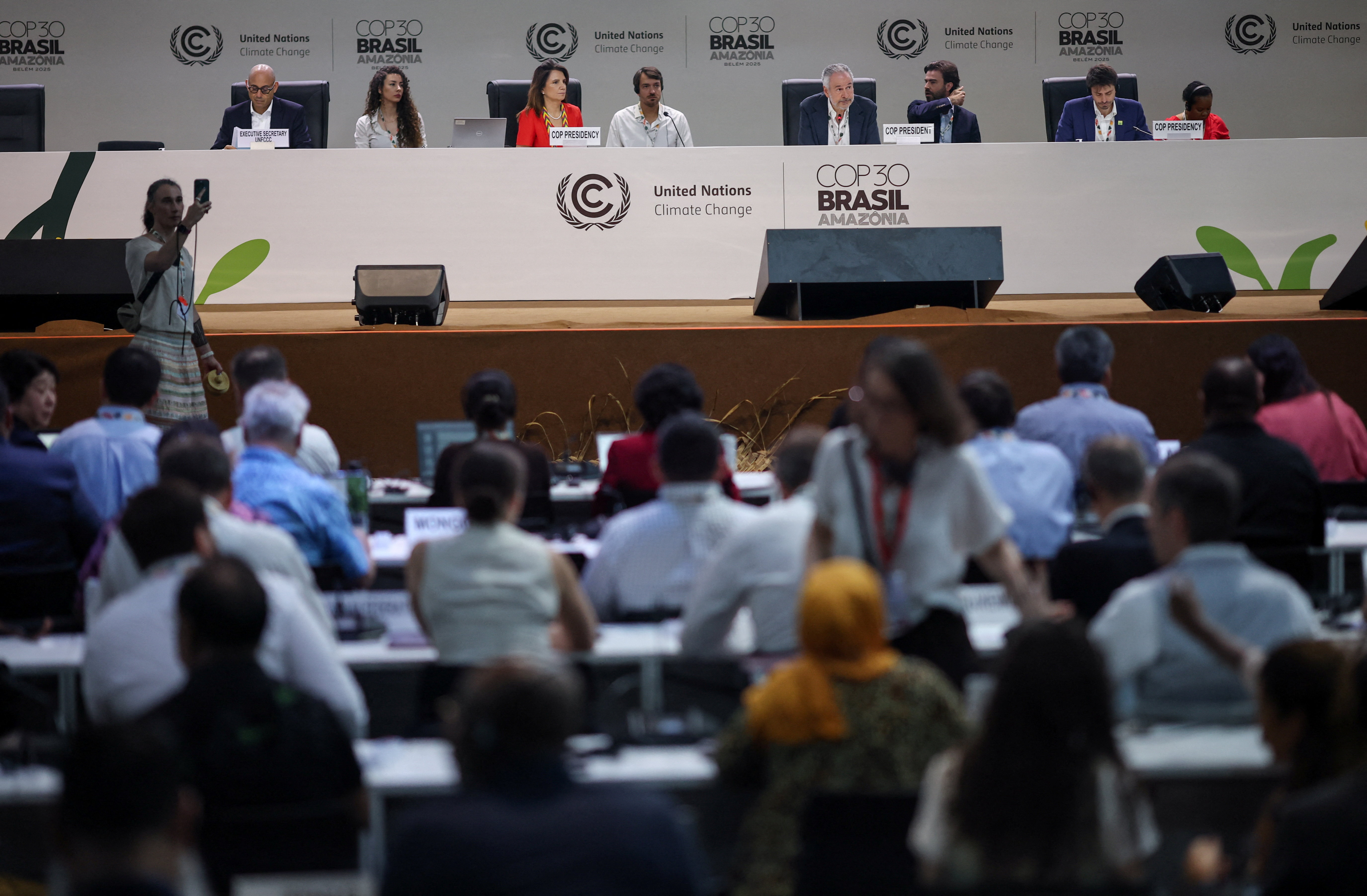 Brazil's COP30 President Andre Correa do Lago and Executive Director Ana Toni attend a plenary session during the UN Climate Change Conference (COP30), in Belem, Brazil, November 21, 2025. REUTERS/Adriano Machado