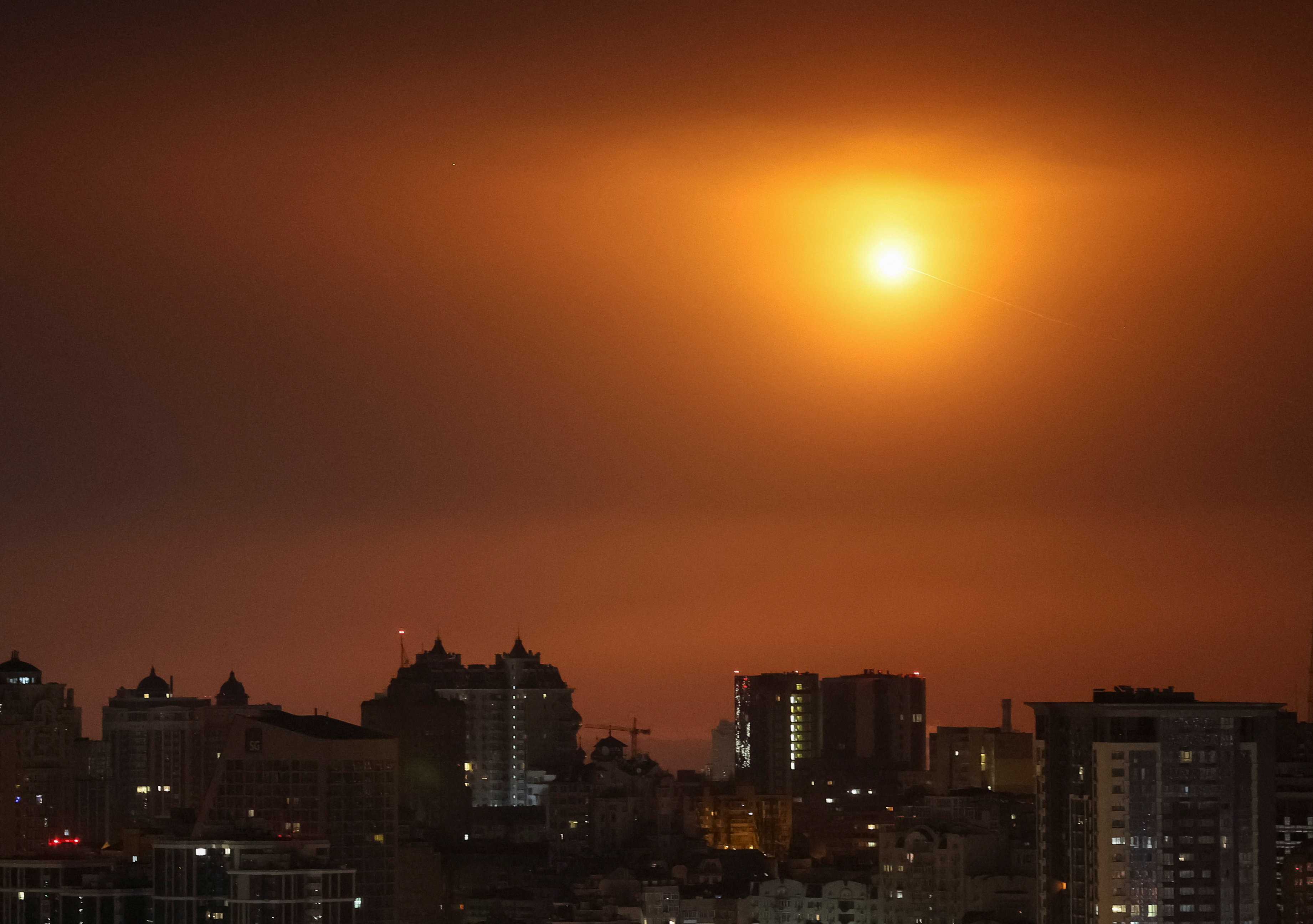 An explosion of a Russian drone in the sky over the city during a Russian missile and drone strike, amid Russia's attack on Ukraine, in Kyiv, Ukraine November 25, 2025. REUTERS/Gleb Garanich